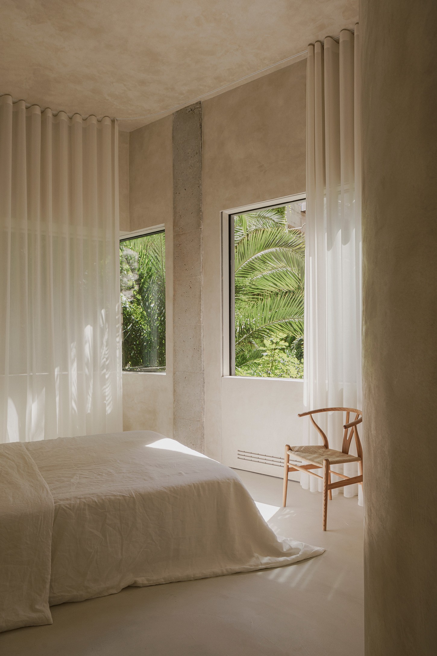 ZØ Residence by Studio Beta Ø — A bedroom interior characterized by restraint and material honesty.