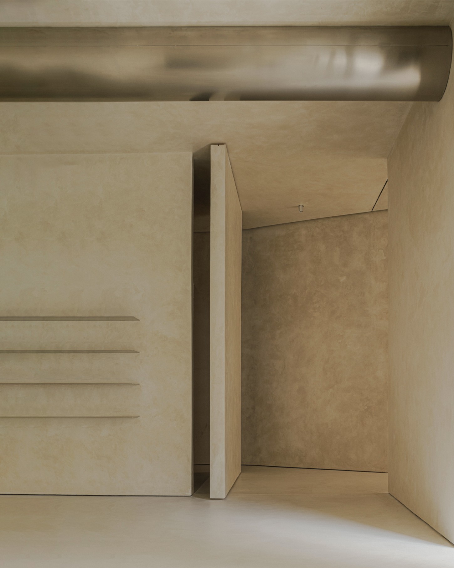 ZØ Residence by Studio Beta Ø — A minimalist interior volume rendered in monochromatic plaster and concrete, defined by a recessed architectural niche that frames depth and shadow.
