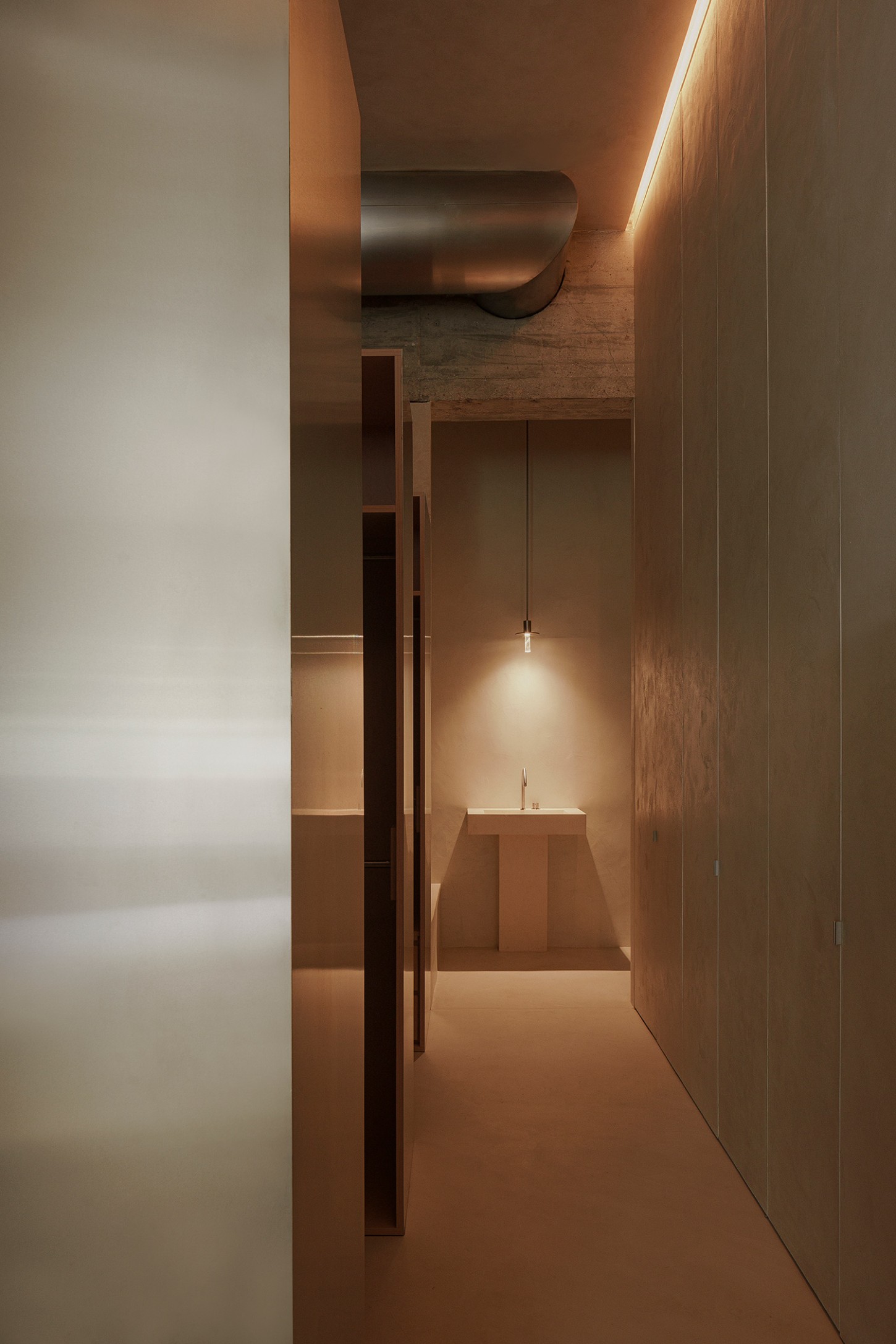 ZØ Residence by Studio Beta Ø — A narrow corridor perspective reveals the ZØ Residence's material restraint and spatial choreography.