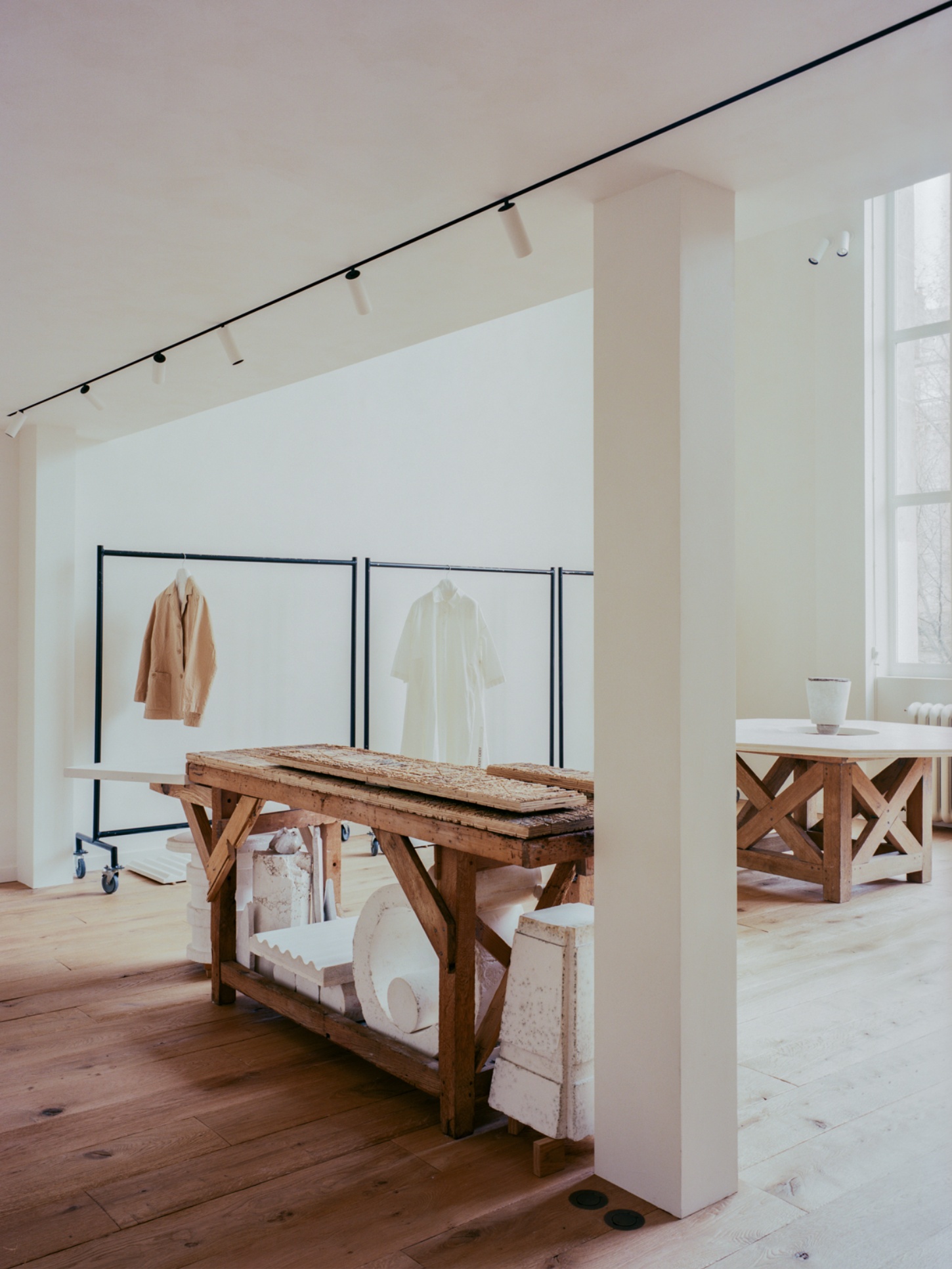 Casey Casey Showroom by Atelier NEA — The Casey Casey showroom interior demonstrates a deliberate material honesty through layered timber elements and restrained color palette.