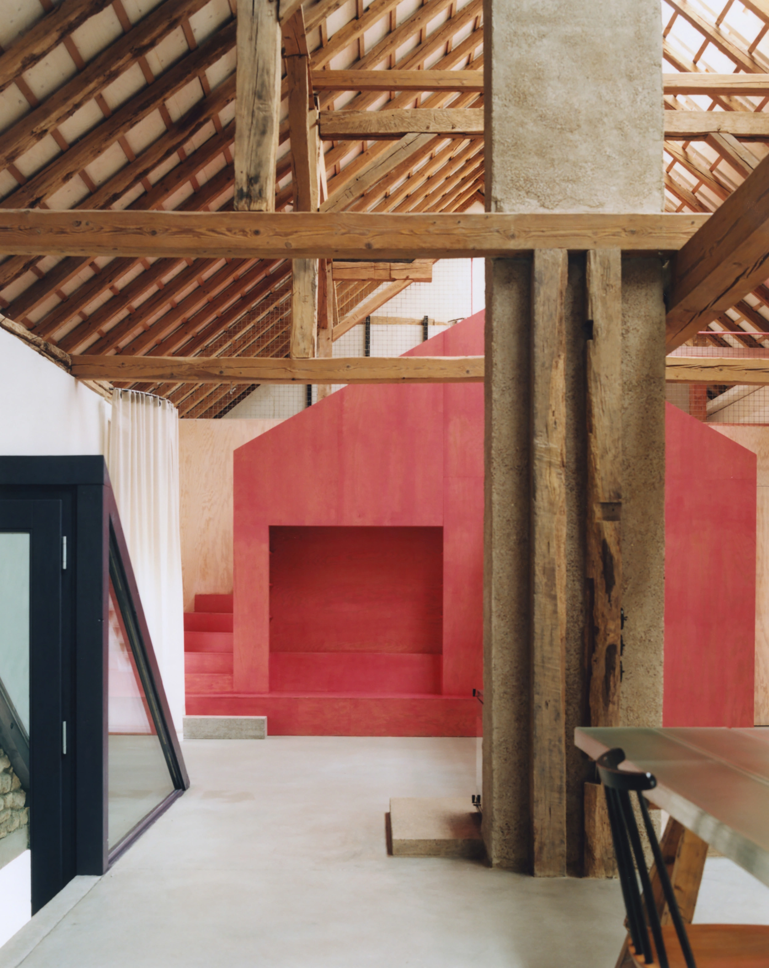 Erika and Willi's Barn by Piertzovanis Toews — The barn interior reveals the layering of intervention and preservation through spatial composition.