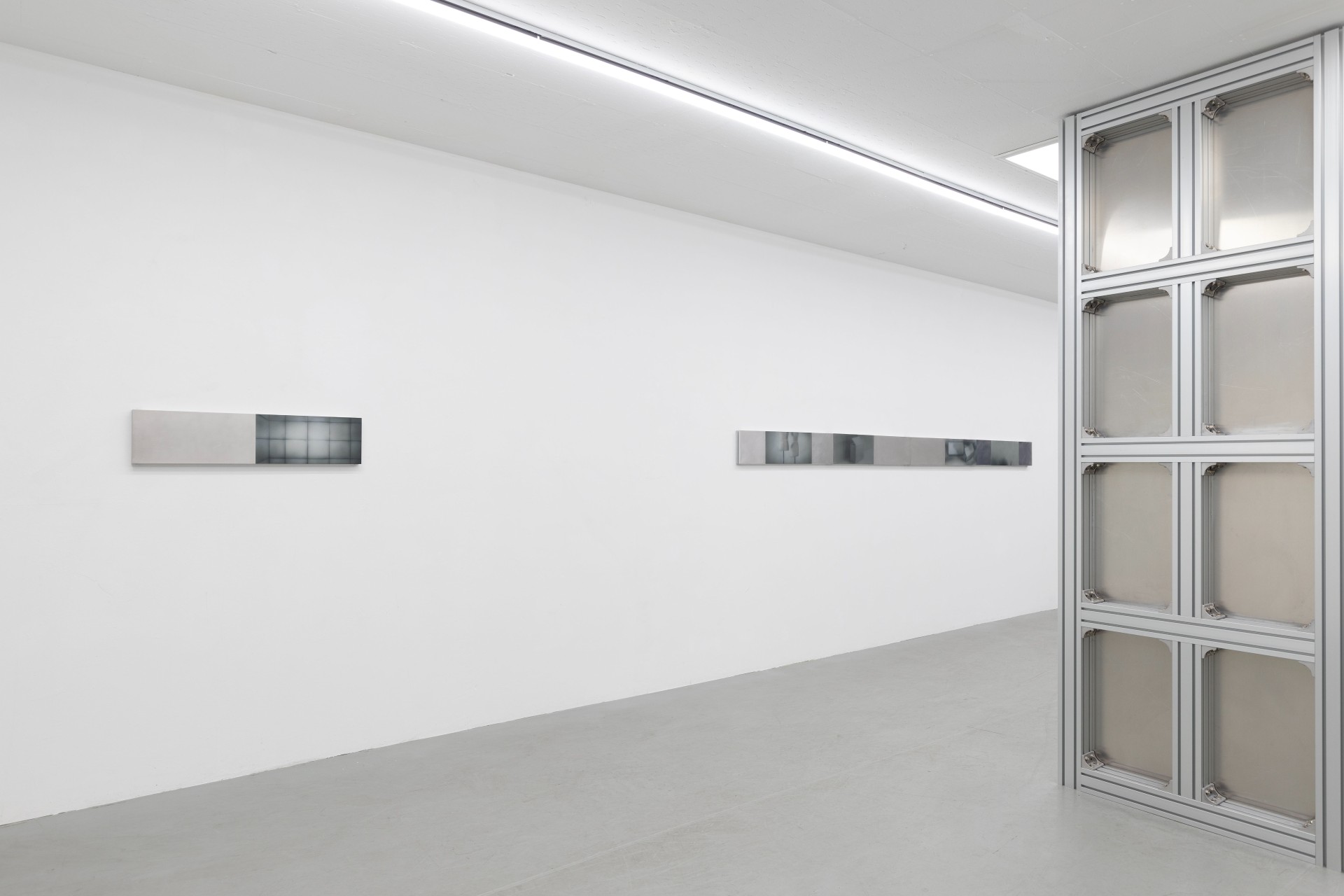 Offline Body by Myungchan Kim at dive.seoul — Two horizontal paintings mounted at eye level on opposing white walls within a minimalist gallery interior.
