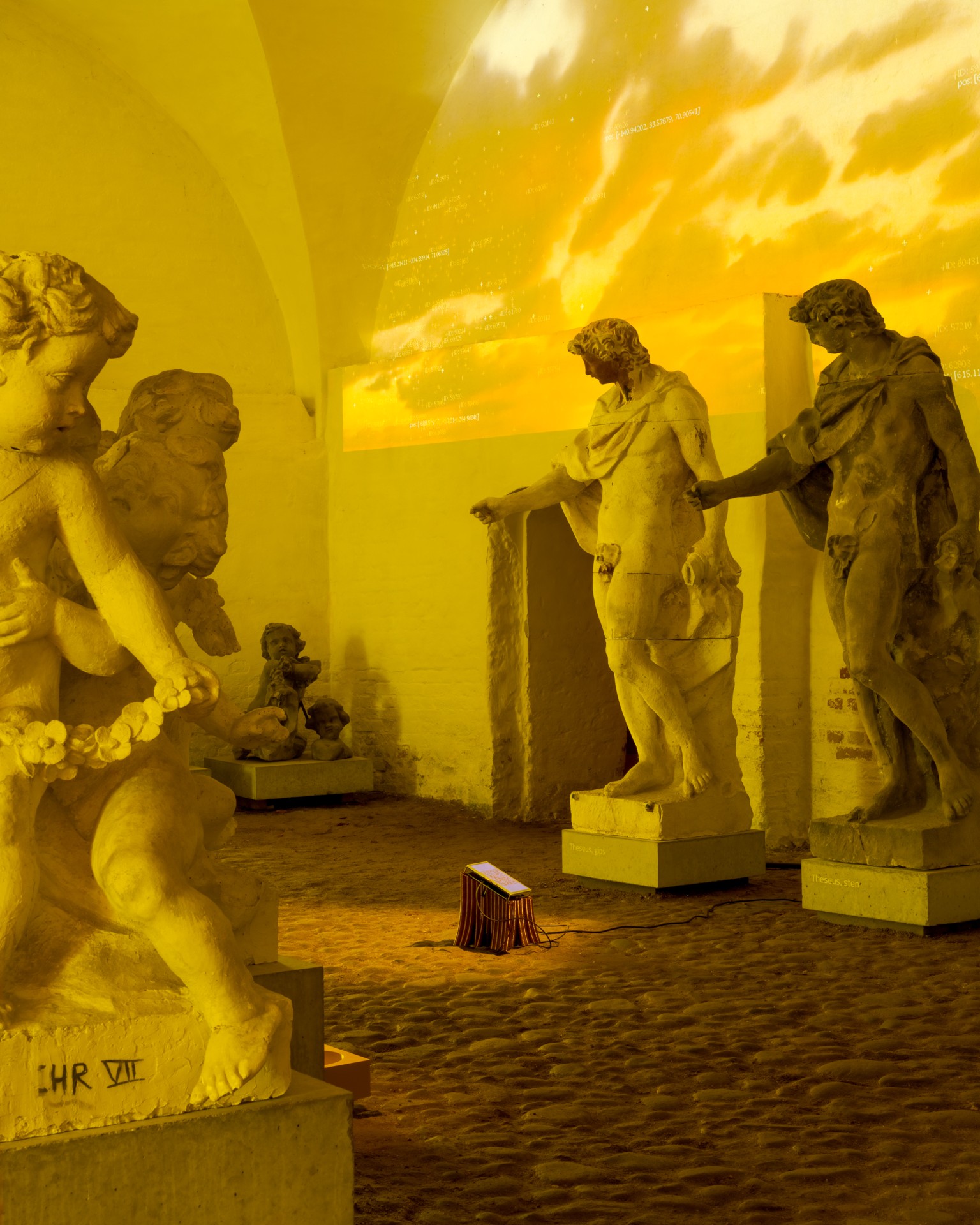 Techno Mythologies by Wang & Söderström at Christian IV’s Brewery — Lime-green monochromatic gallery environment bathed in saturated artificial light reveals classical plaster figures positioned as historical monuments...