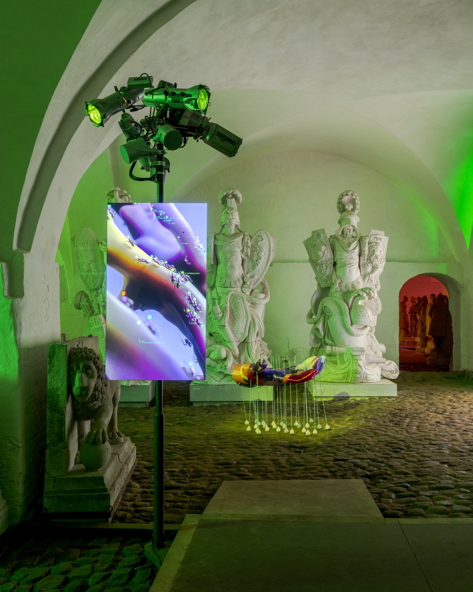 Techno Mythologies by Wang & Söderström at Christian IV’s Brewery — Within Christian IV's Brewery, Wang & Söderström stage a chromatic rupture: an arched corridor rendered in saturated lime-green ambient light contrasts...