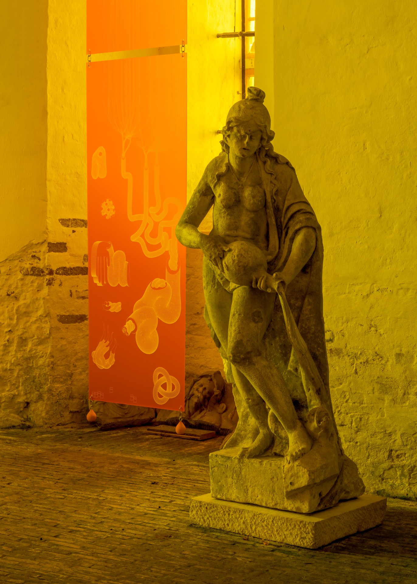 Techno Mythologies by Wang & Söderström at Christian IV’s Brewery — A classical stone sculpture occupies the foreground of a gallery corridor bathed in monochromatic lime-green artificial light.