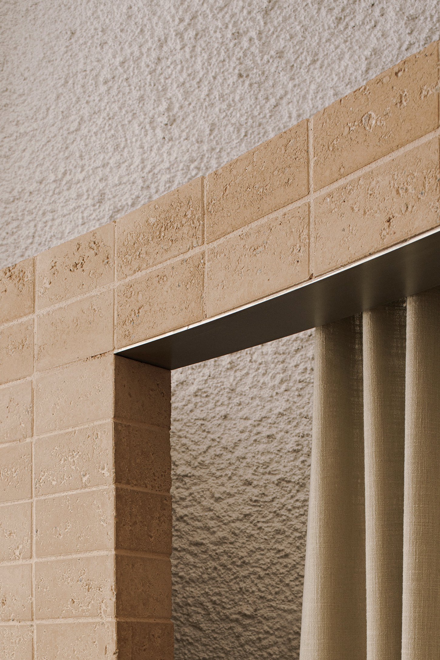 Neutrale by estudio DIIR — A close-up detail of the Neutrale interior showcases the material hierarchy and construction precision.