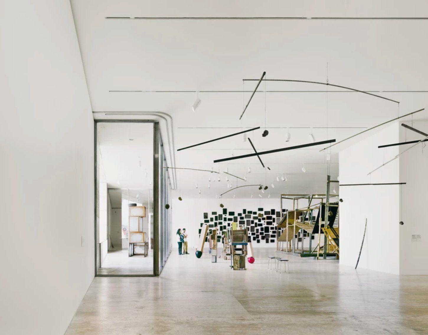 Museo Jumex by David Chipperfield Architects — Interior exhibition space of Museo Jumex featuring a soaring white ceiling articulated by a sawtooth roofline with three angular peaks.