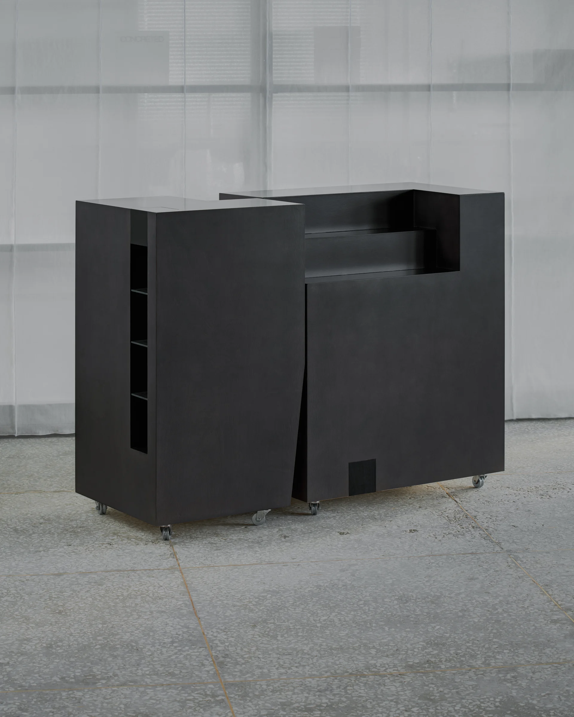 CONCRETED by molae, photographed by Noh Pu Reum — The Seoul showroom entrance frames a glazed threshold with translucent polycarbonate or acrylic panels dividing the street-level passage.