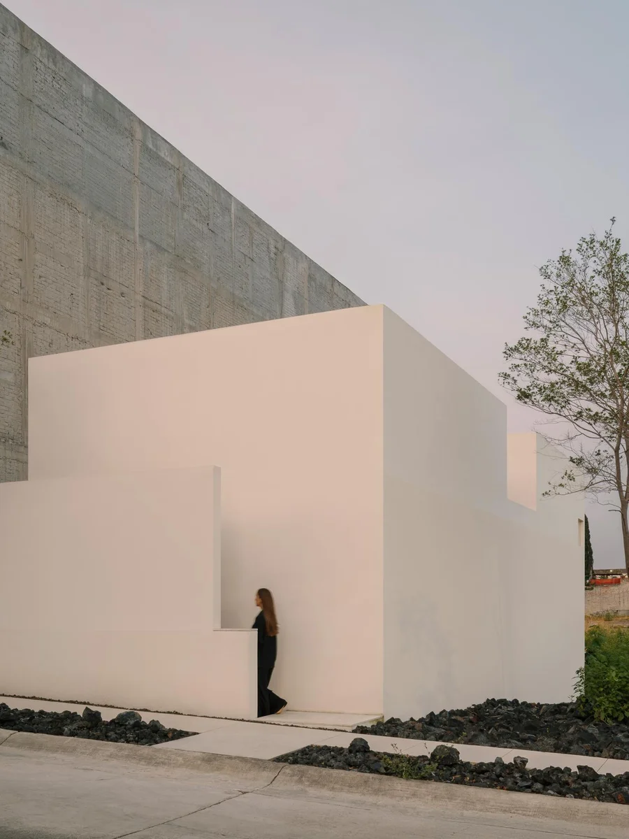 Kehai House by HW Studio — Morelia, Mexico: the studio's own house in Morelia, built around a stone garden instead of a room