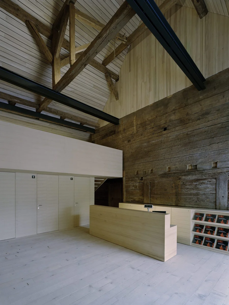 The Angelika Kauffmann Museum by Dietrich Untertrifaller, photographed by Bruno Klomfar — The Angelika Kauffmann Museum occupies a 16th-century Bregenzerwald farmhouse with the characteristic steep pitched roof and timber construction of the region.
