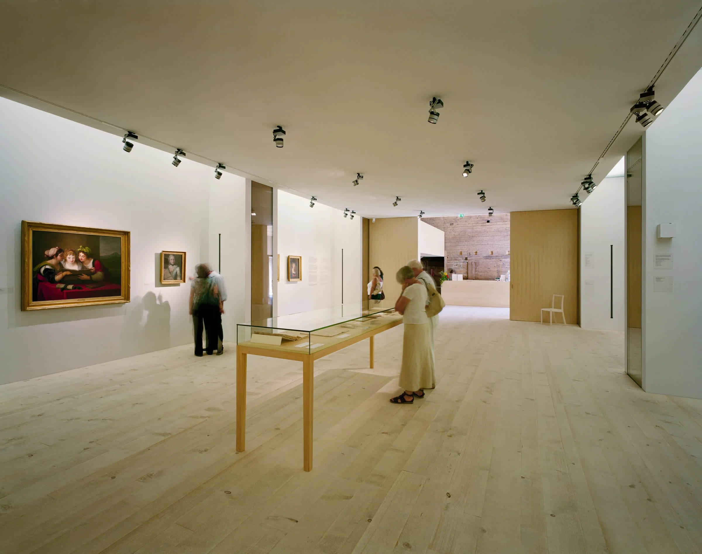 The Angelika Kauffmann Museum by Dietrich Untertrifaller, photographed by Bruno Klomfar — The museum's reception area occupies a converted farmhouse interior, where contemporary interventions establish visual and functional clarity within the heritage str
