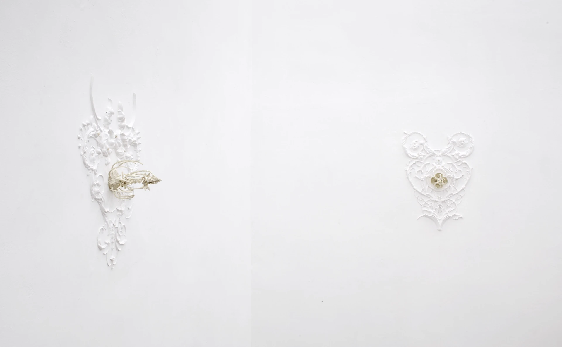 The Fire and its Ghosts by Andrea Luzi + Nicola Ghirardelli, photographed by Oscar Giacomini — Dark object-sized panel titled Tumulazione di una lacrima leaning into the wall with a candle-bright mark at center.