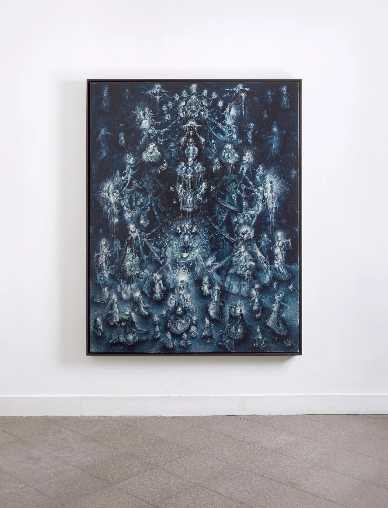 The Fire and its Ghosts by Andrea Luzi + Nicola Ghirardelli, photographed by Oscar Giacomini — Small white pedestal with a bronze-and-silvered-branch sculpture at gallery entrance.