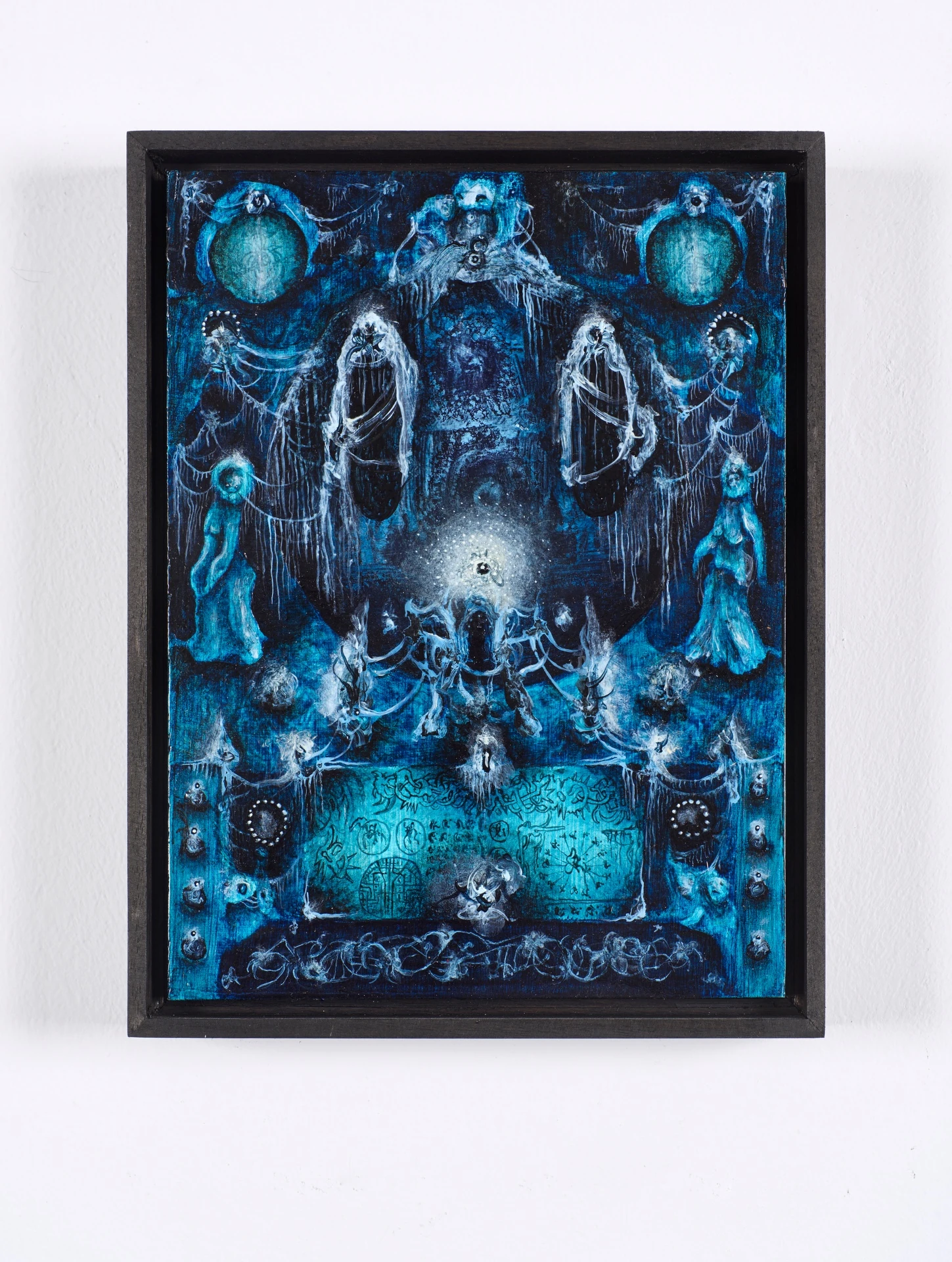 The Fire and its Ghosts by Andrea Luzi + Nicola Ghirardelli, photographed by Oscar Giacomini — Side view of the plaster bas-relief reliquary with a brass-valve flower at its heart.