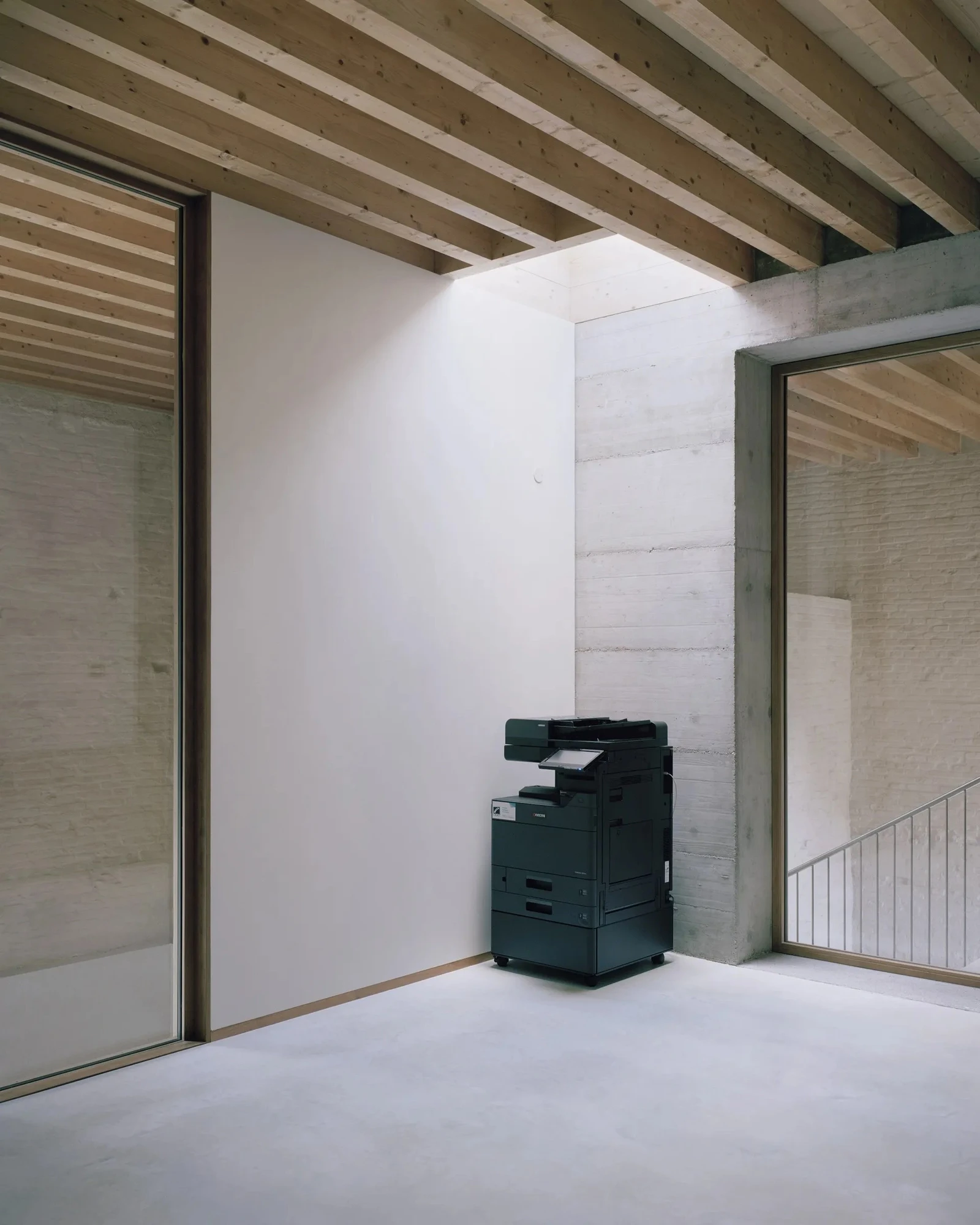 Vis-à-vis Restoration of Villa Doná and Barchessa by RigonSimonetti, photographed by Rory Gardiner, Alberto Sinigaglia — Rear garden view: the new annex in white concrete with the terracotta-tiled roof, the 19th-century park and mature trees behind the…
