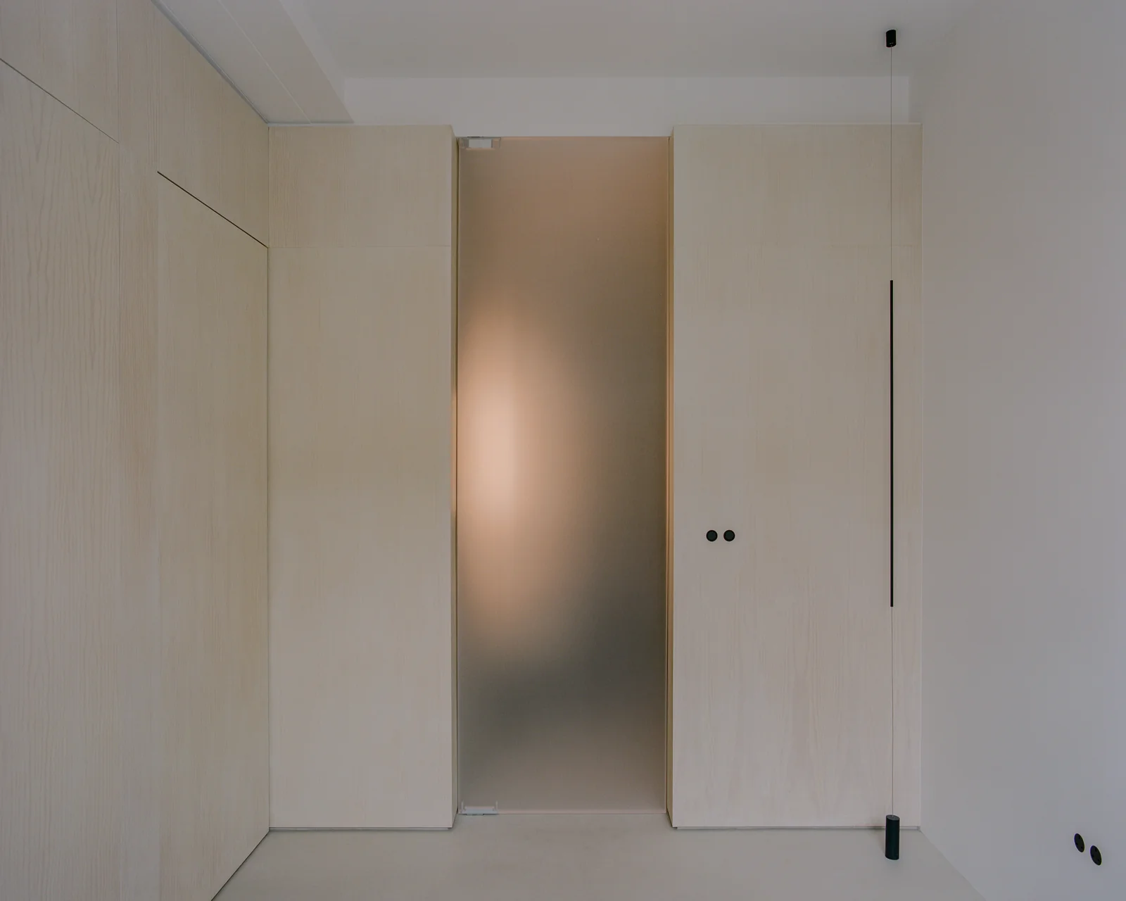 Studio Four by Paraforma — London, United Kingdom: a timber wall system that makes thresholds do the work rooms used to do.
