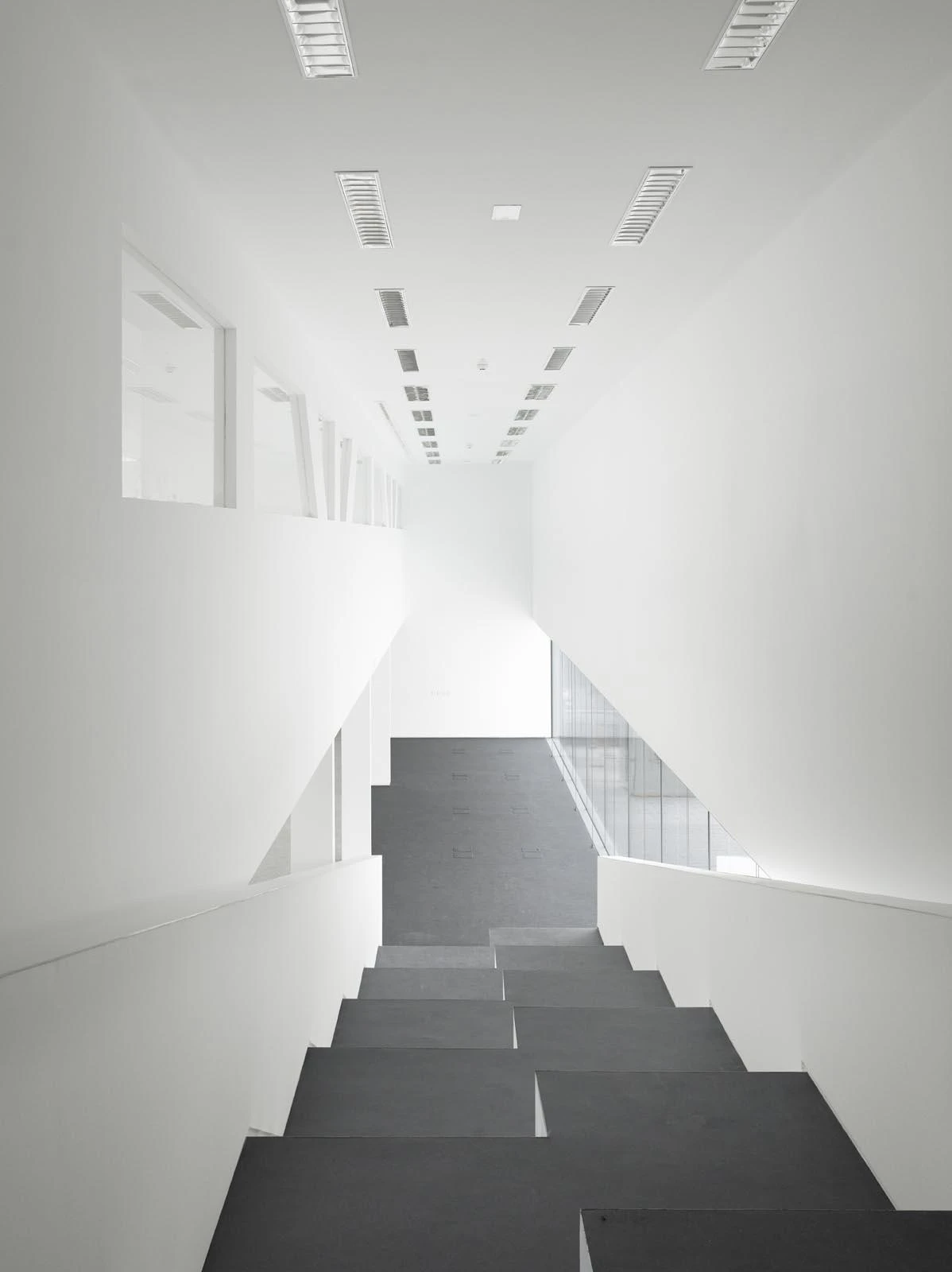 Barceló Market by Nieto Sobejano Arquitectos, Madrid Spain, market library sports hall, opaline cast glass facade, civic complex, photographed by Roland Halbe and Marcela Grassi