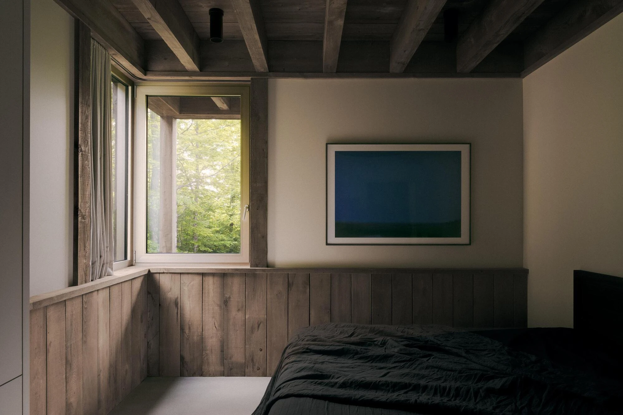 SONO Residence by Atelier Carle, Wentworth-North Quebec Canada, mountain second home, board-formed concrete, hemlock structure, forest view, photographed by Félix Michaud