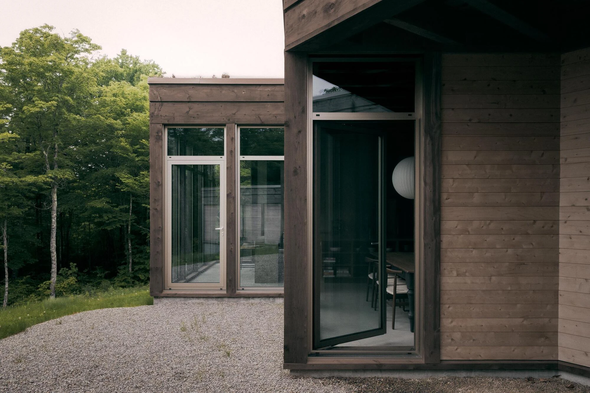SONO Residence by Atelier Carle, Wentworth-North Quebec Canada, mountain second home, board-formed concrete, hemlock structure, forest view, photographed by Félix Michaud