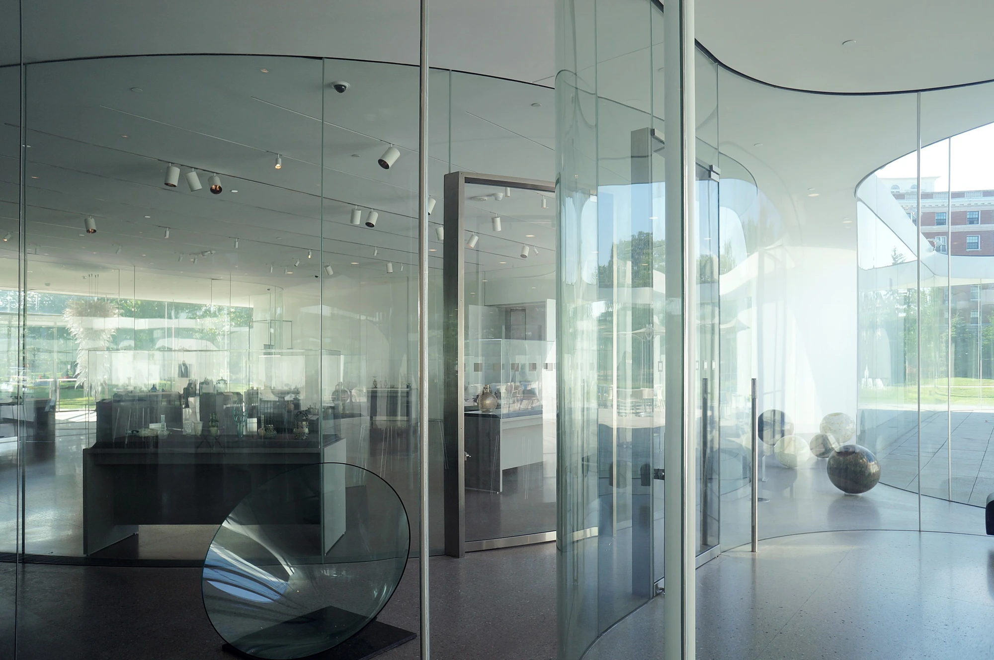 Toledo Museum Glass Pavilion by SANAA, Toledo Ohio USA, curved low-iron laminated glass, double-skin envelope, hot shop gallery adjacency, photographed by Trevor Patt