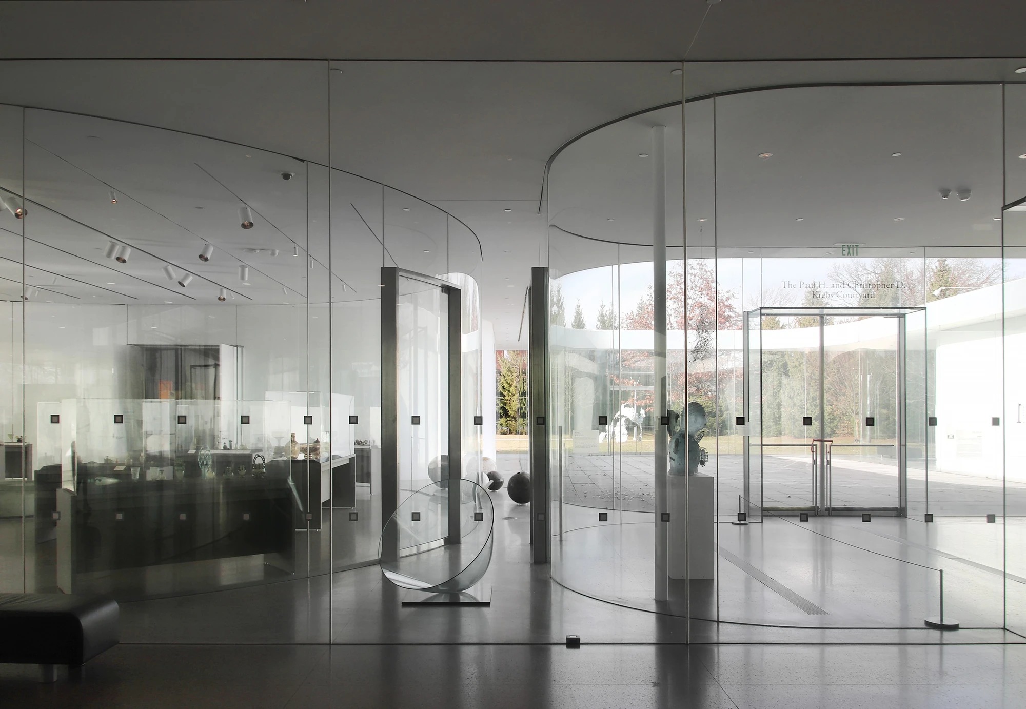 Toledo Museum Glass Pavilion by SANAA, Toledo Ohio USA, curved low-iron laminated glass, double-skin envelope, hot shop gallery adjacency, photographed by Trevor Patt