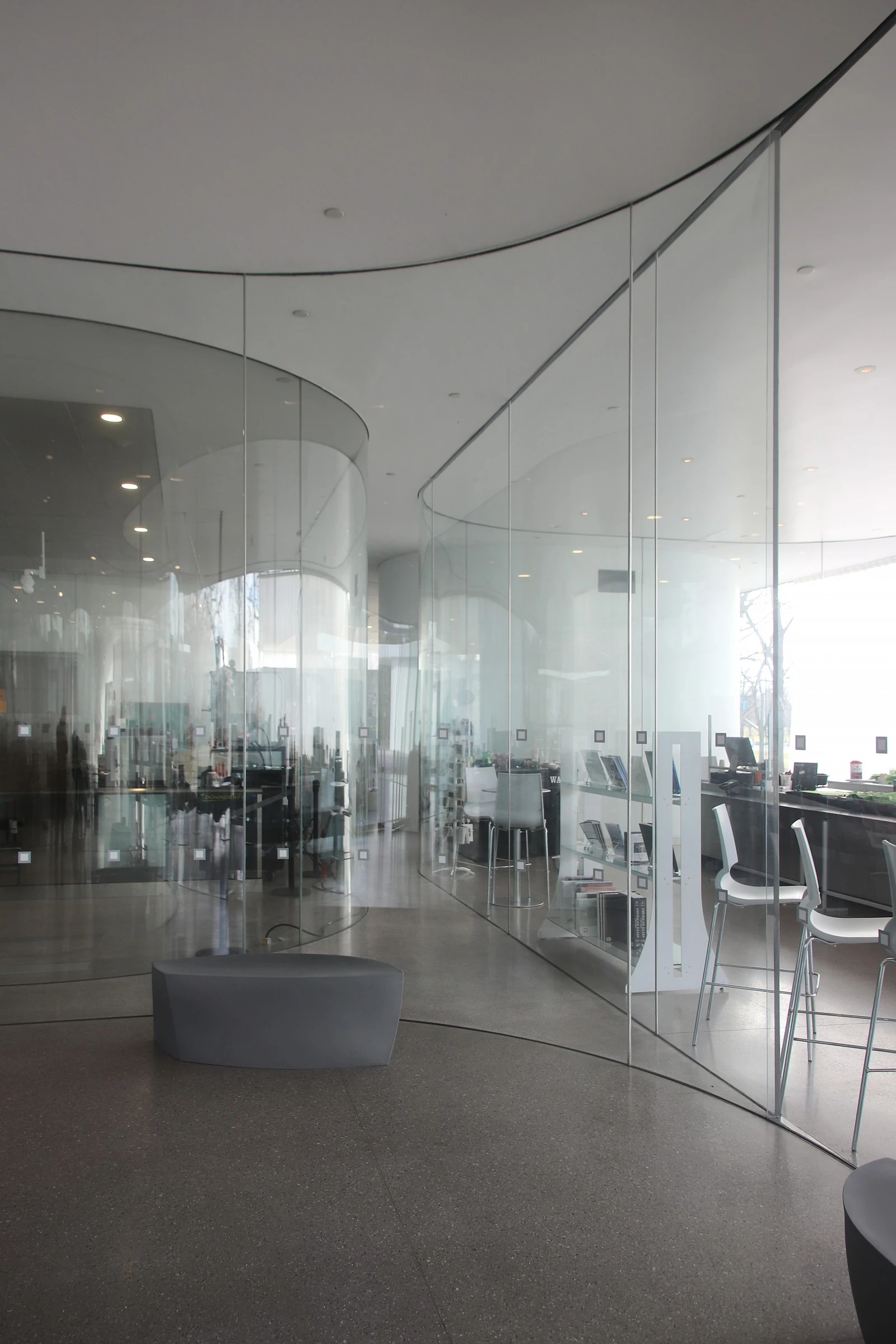 Toledo Museum Glass Pavilion by SANAA, Toledo Ohio USA, curved low-iron laminated glass, double-skin envelope, hot shop gallery adjacency, photographed by Trevor Patt