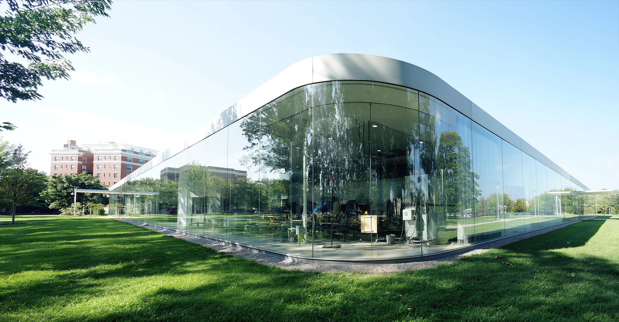 Toledo Museum Glass Pavilion by SANAA, Toledo Ohio USA, curved low-iron laminated glass, double-skin envelope, hot shop gallery adjacency, photographed by Trevor Patt