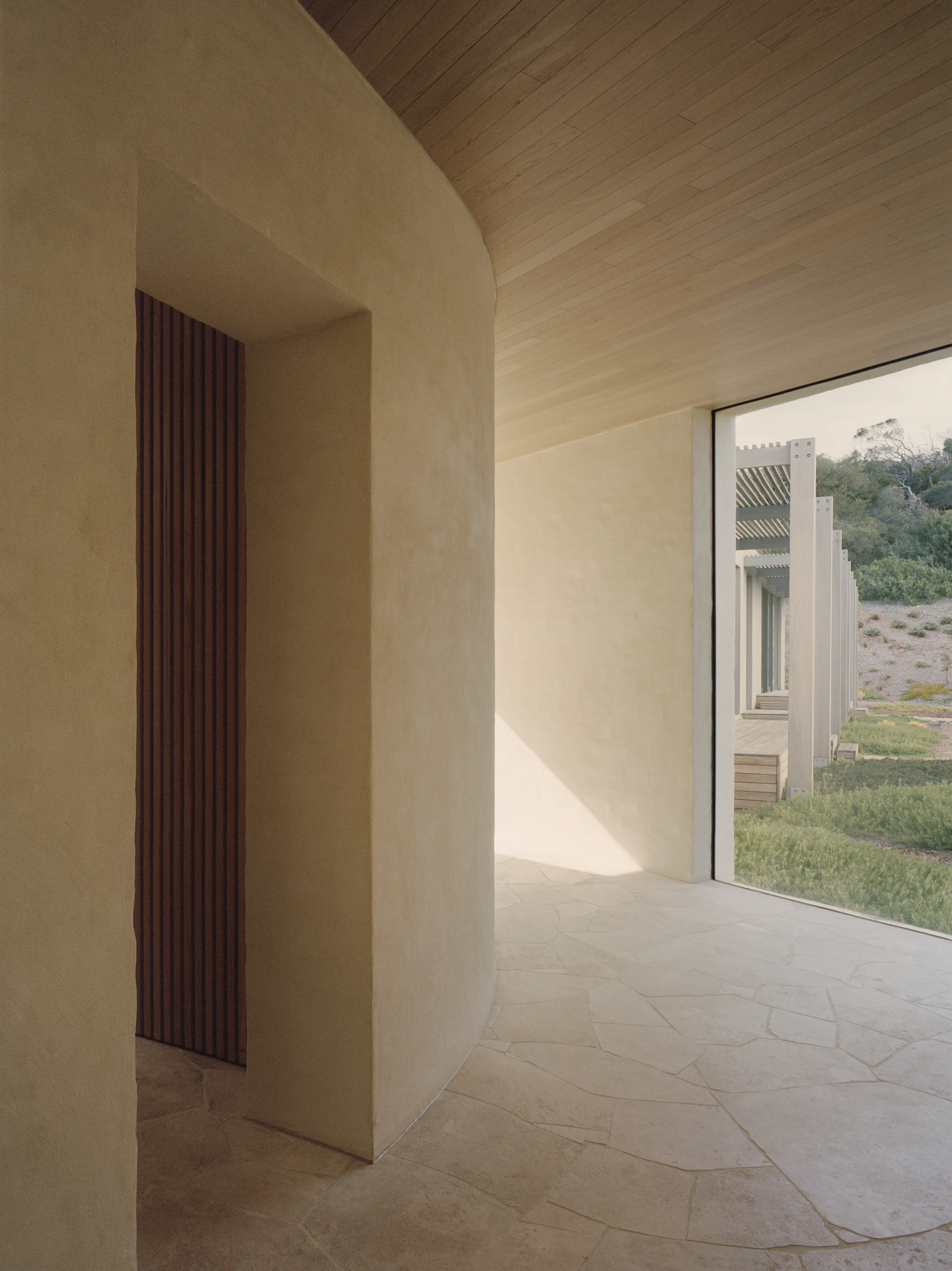 Wildcoast House by Pandolfini Architects, Mornington Peninsula Victoria Australia, three blade walls, recycled D-grade brick, Moonah timber, coastal landscape, photographed by Tasha Tylee