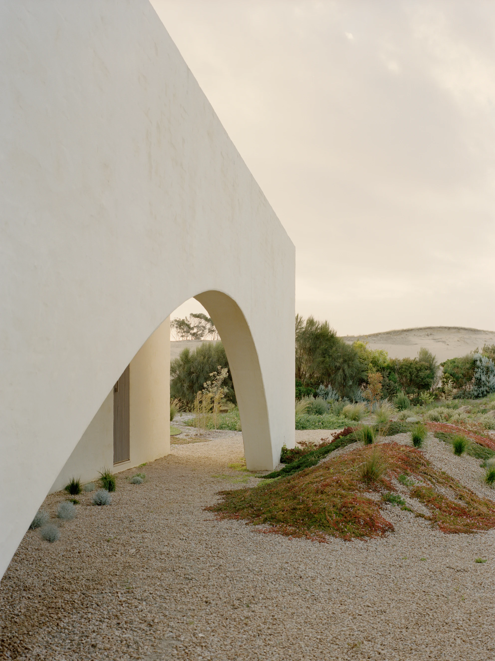 Wildcoast House by Pandolfini Architects, Mornington Peninsula Victoria Australia, three blade walls, recycled D-grade brick, Moonah timber, coastal landscape, photographed by Tasha Tylee