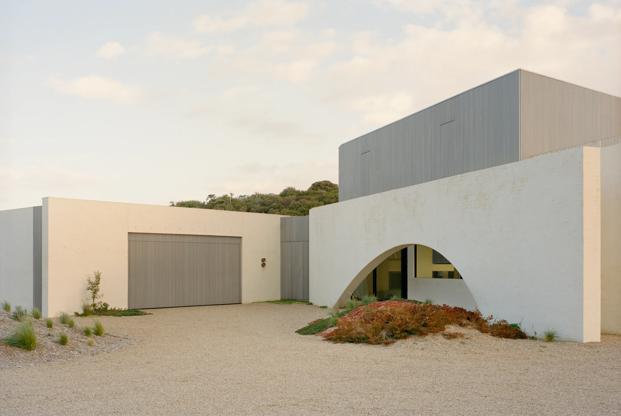 Wildcoast House by Pandolfini Architects, Mornington Peninsula Victoria Australia, three blade walls, recycled D-grade brick, Moonah timber, coastal landscape, photographed by Tasha Tylee