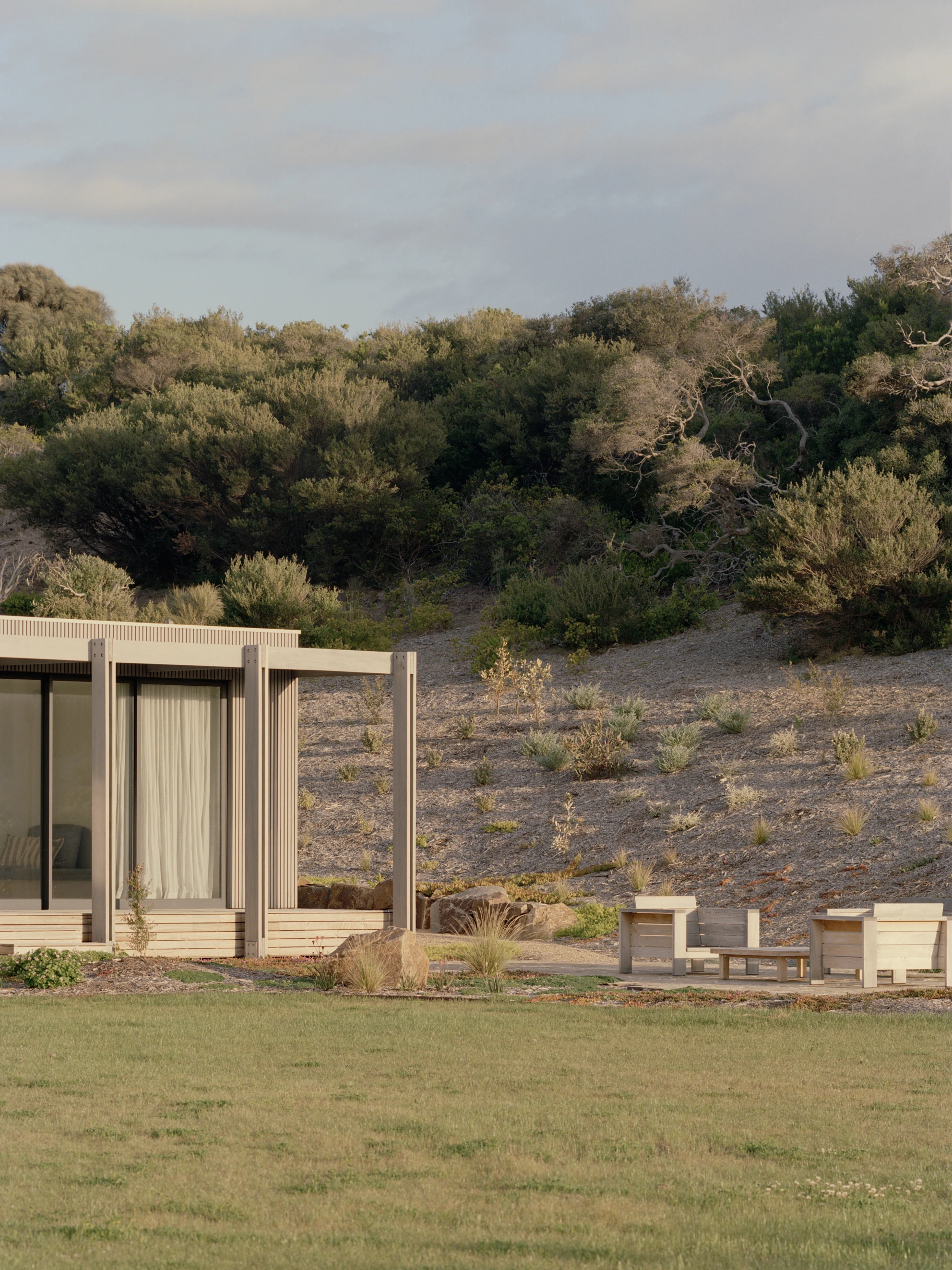 Wildcoast House by Pandolfini Architects, Mornington Peninsula Victoria Australia, three blade walls, recycled D-grade brick, Moonah timber, coastal landscape, photographed by Tasha Tylee
