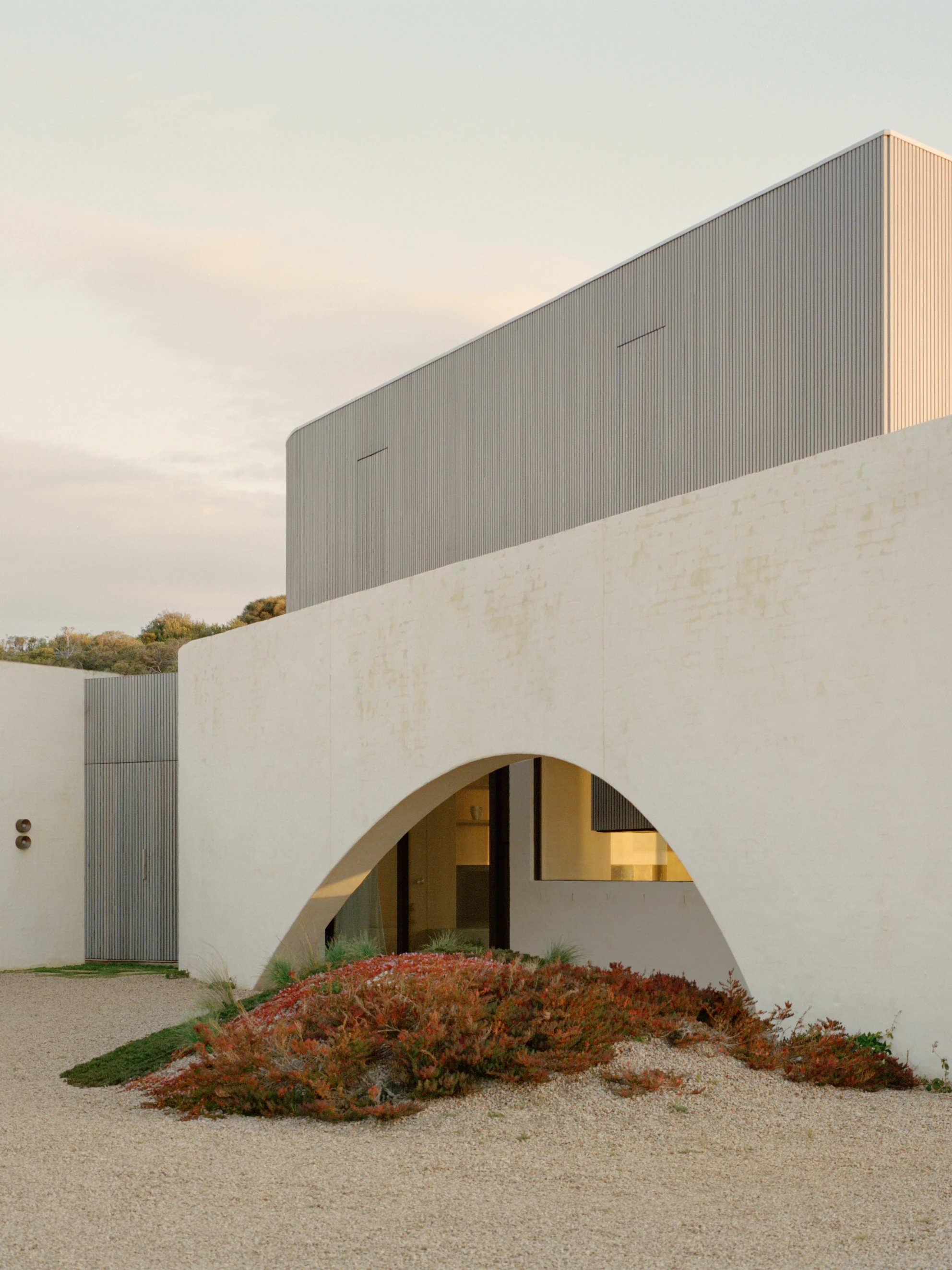 Wildcoast House by Pandolfini Architects, Mornington Peninsula Victoria Australia, three blade walls, recycled D-grade brick, Moonah timber, coastal landscape, photographed by Tasha Tylee