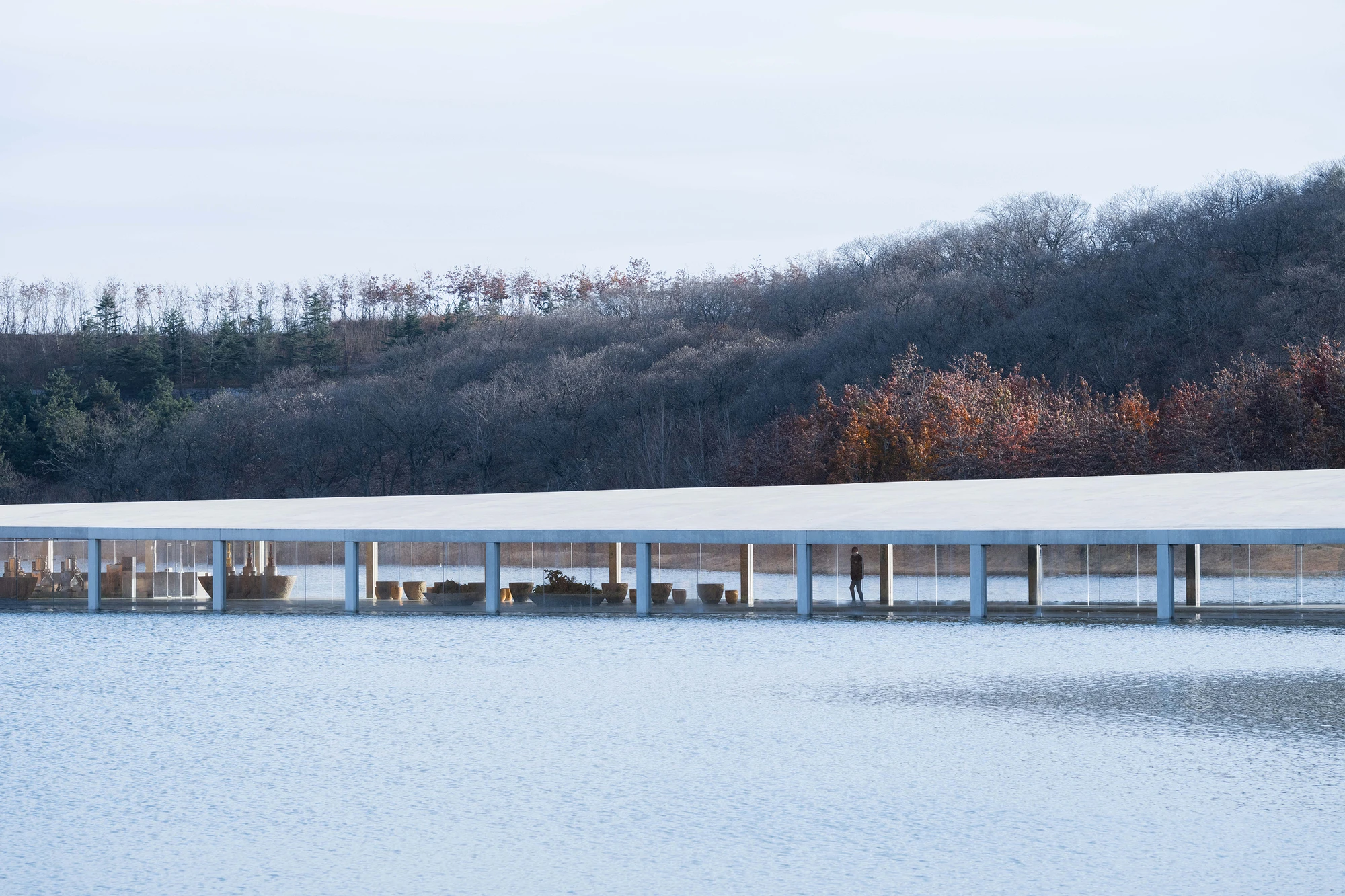 Zaishui Art Museum by junya ishigami + associates, Rizhao Shandong China, one kilometre long, lake, slender columns in water, sash roof, photographed by arch-exist
