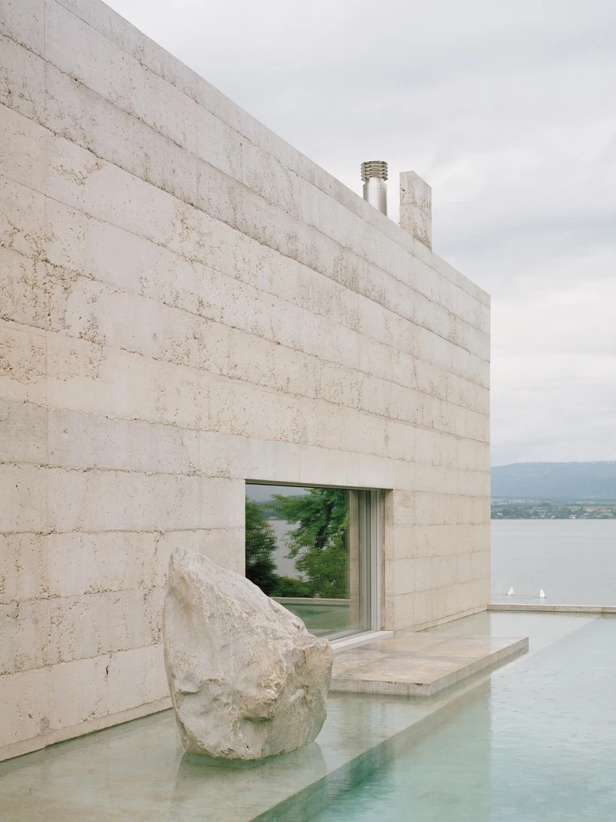 Villa M by Leopold Banchini Architects, Geneva Switzerland, board-formed concrete villa, reflecting water basin, Lake Geneva, Rory Gardiner