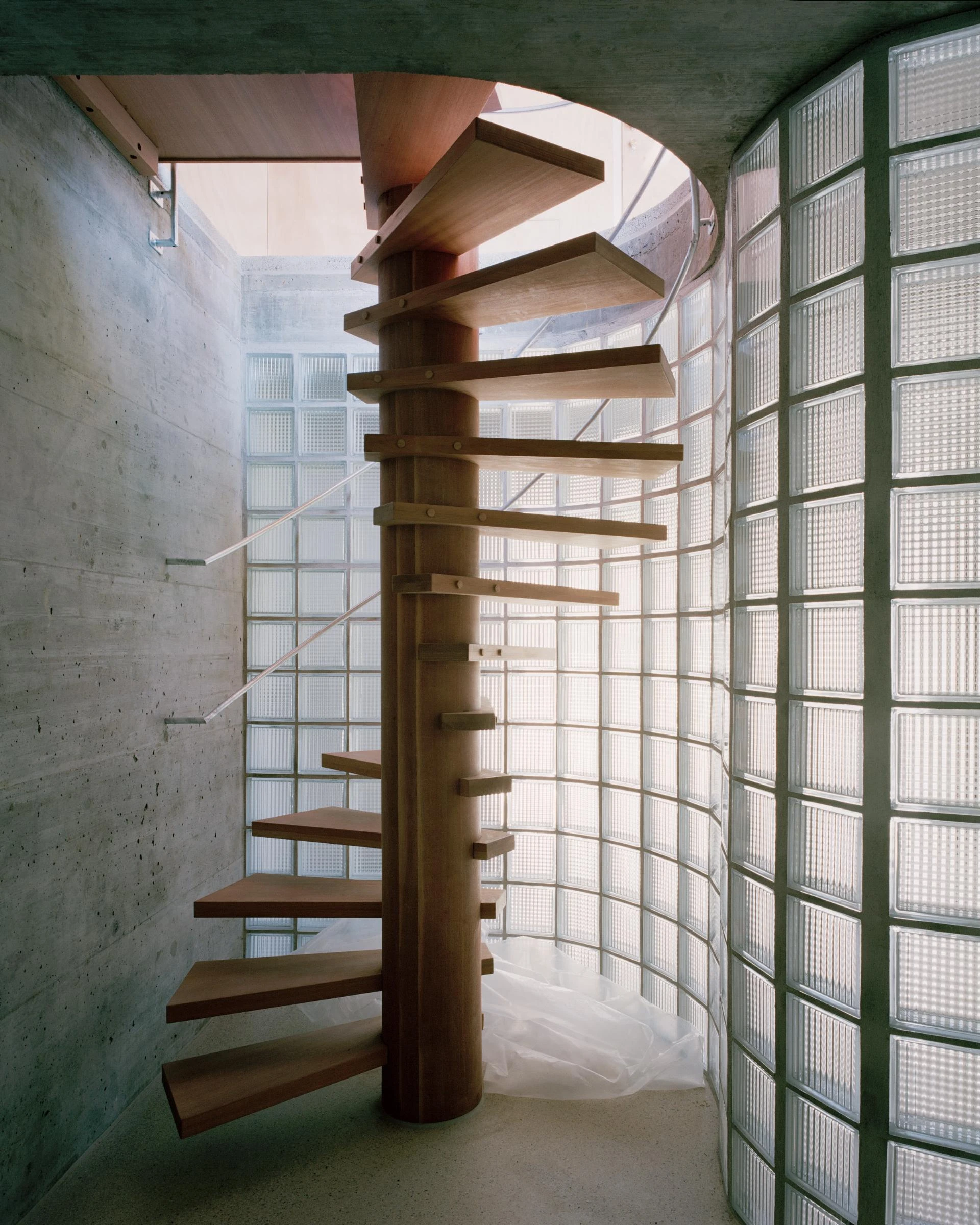 Villa M by Leopold Banchini Architects, Geneva Switzerland, board-formed concrete villa, reflecting water basin, Lake Geneva, Rory Gardiner