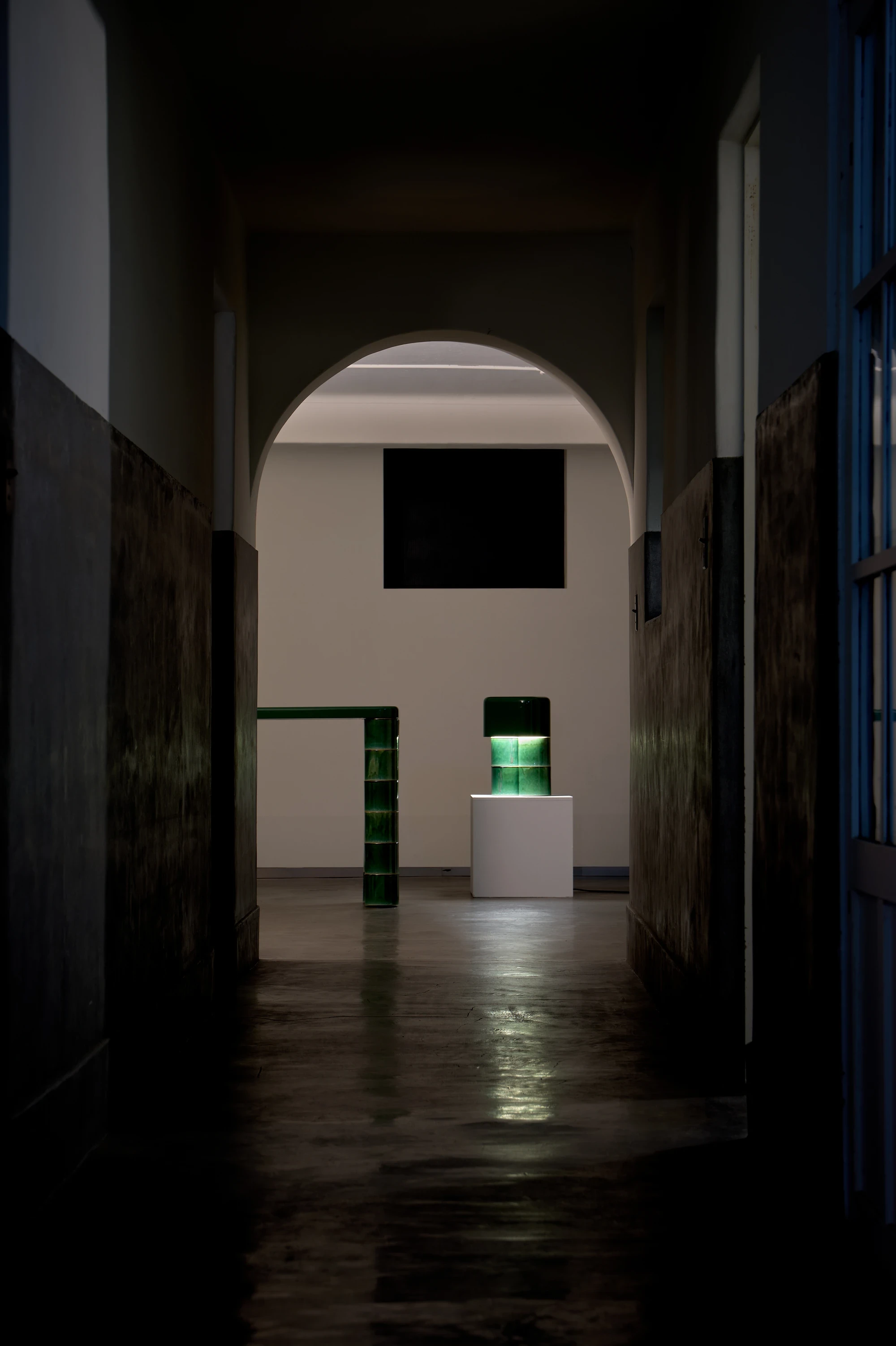 FUSHI by David Caon, photographed by Masayuki Hayashi — The pieces installed in the Kudan exhibition space, console and illuminated lamp framed at the end of a dim arched corridor as part of the Craft x Tech Tokai Project