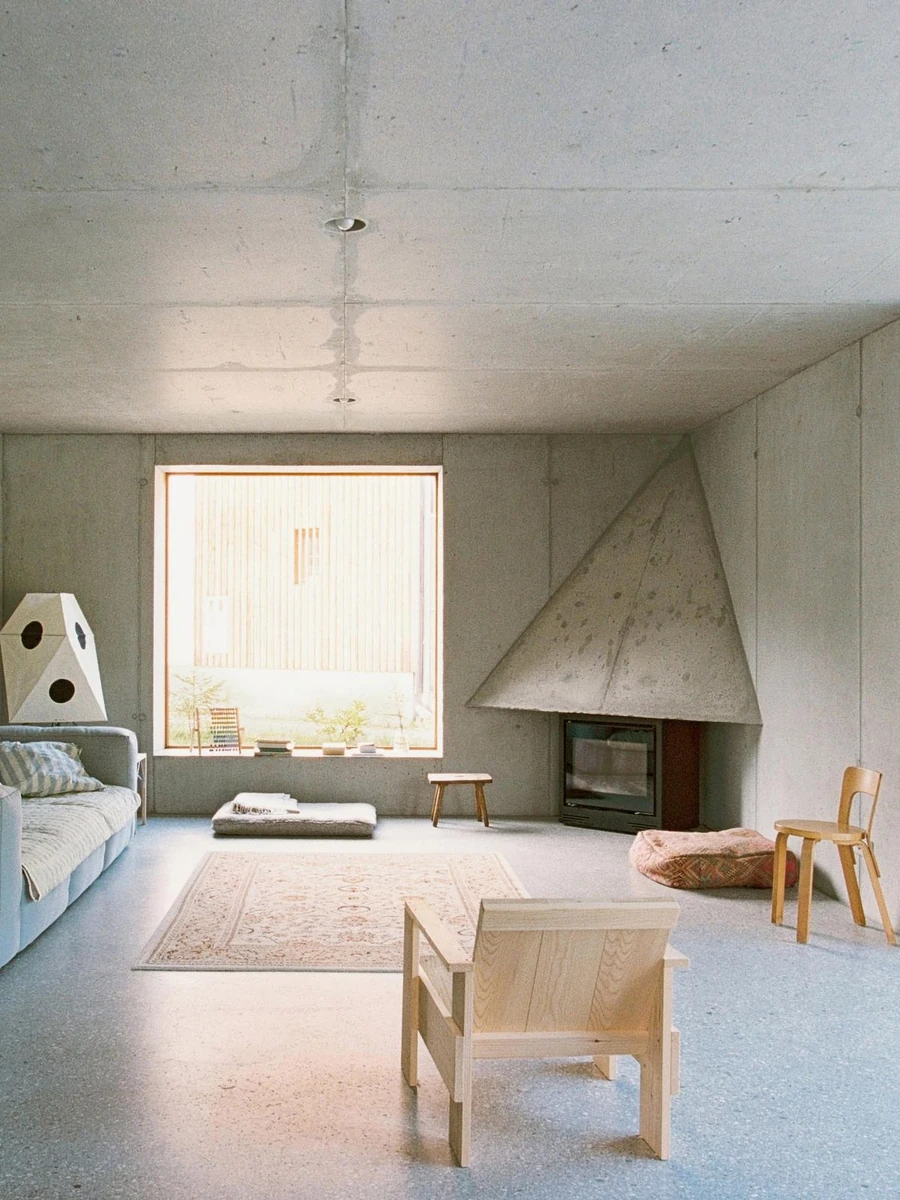 House Alva by Arhitekti Počivašek Petranovič — Gorenjska, Slovenia: a concrete base and a spruce-lined attic in rural Slovenia