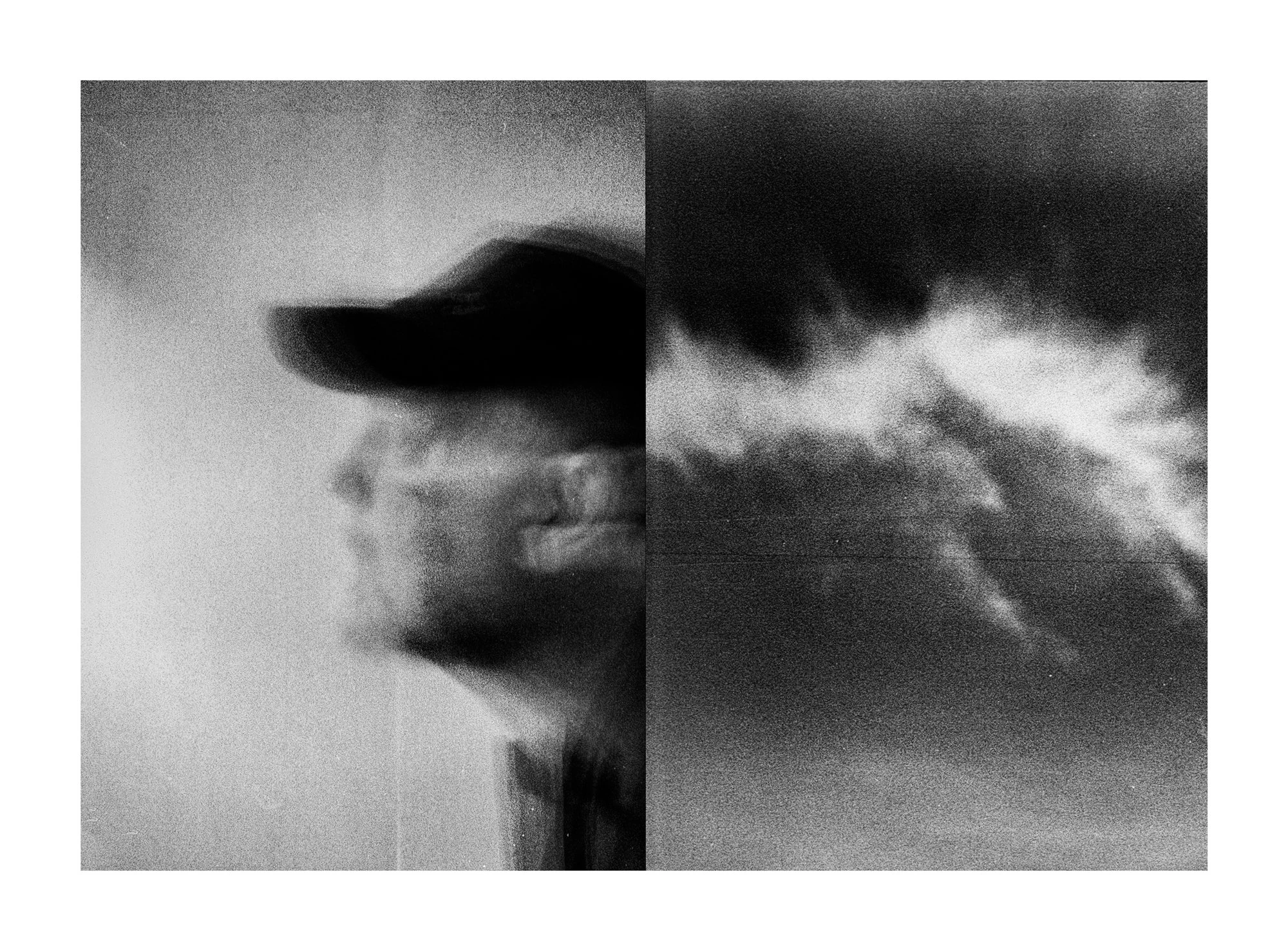 Everything is Wrong by Mark Tamer, photographed by Mark Tamer — A man in a cap smears sideways into motion beside a plume of pale cloud bursting through dark, heavy grain.