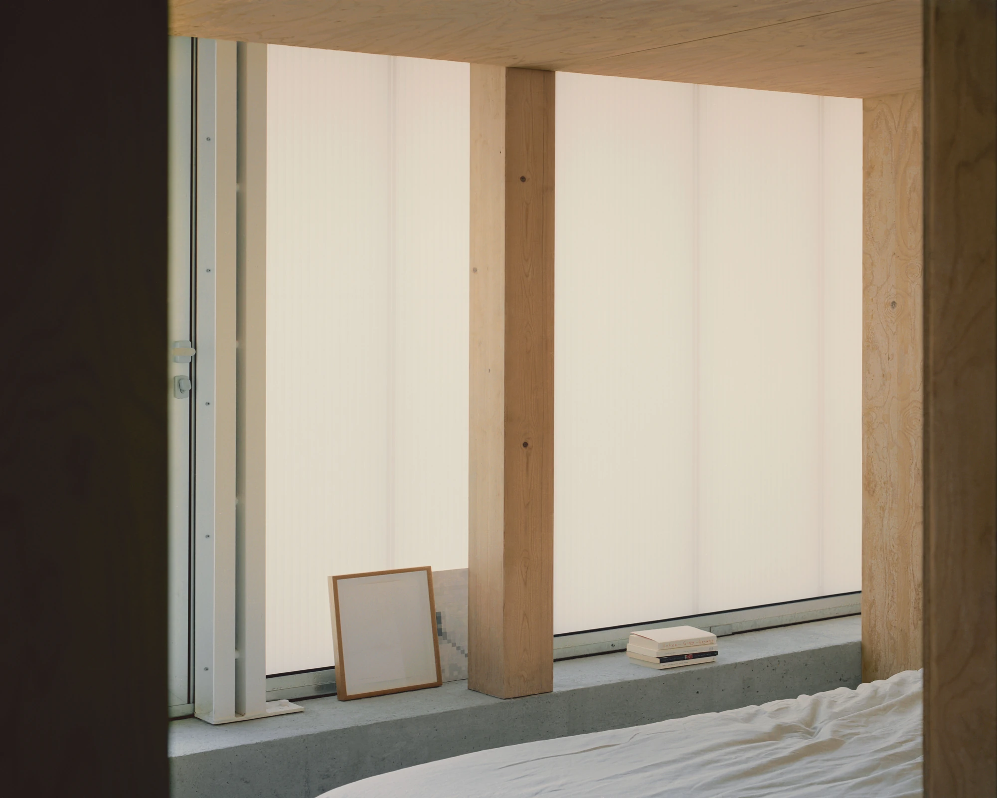 The Old Byre by Gianni Botsford Architects, photographed by Willem Pab — conversion of two farm buildings into a home and artist residency on the Isle of Wight, United Kingdom
