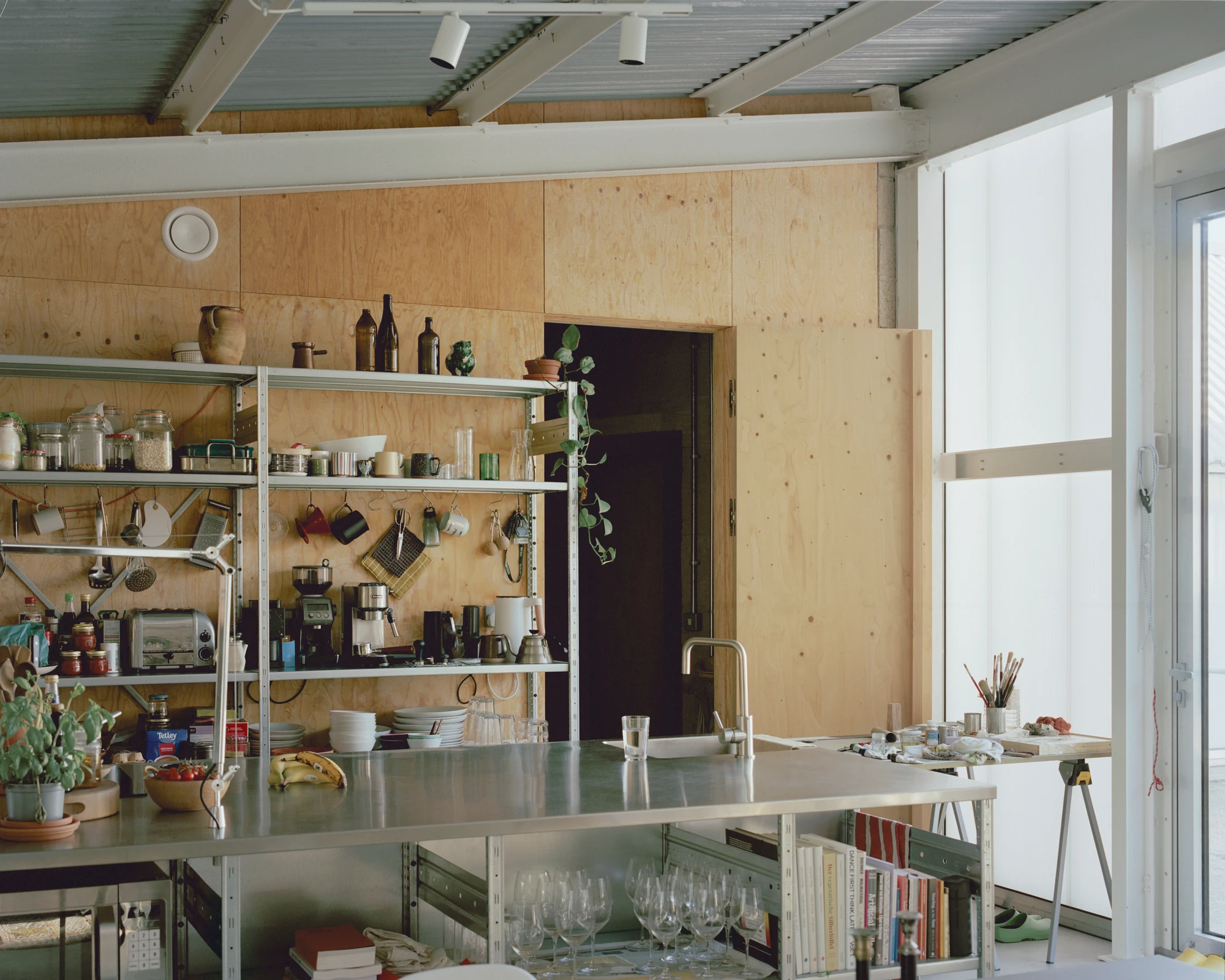 The Old Byre by Gianni Botsford Architects, photographed by Willem Pab — conversion of two farm buildings into a home and artist residency on the Isle of Wight, United Kingdom