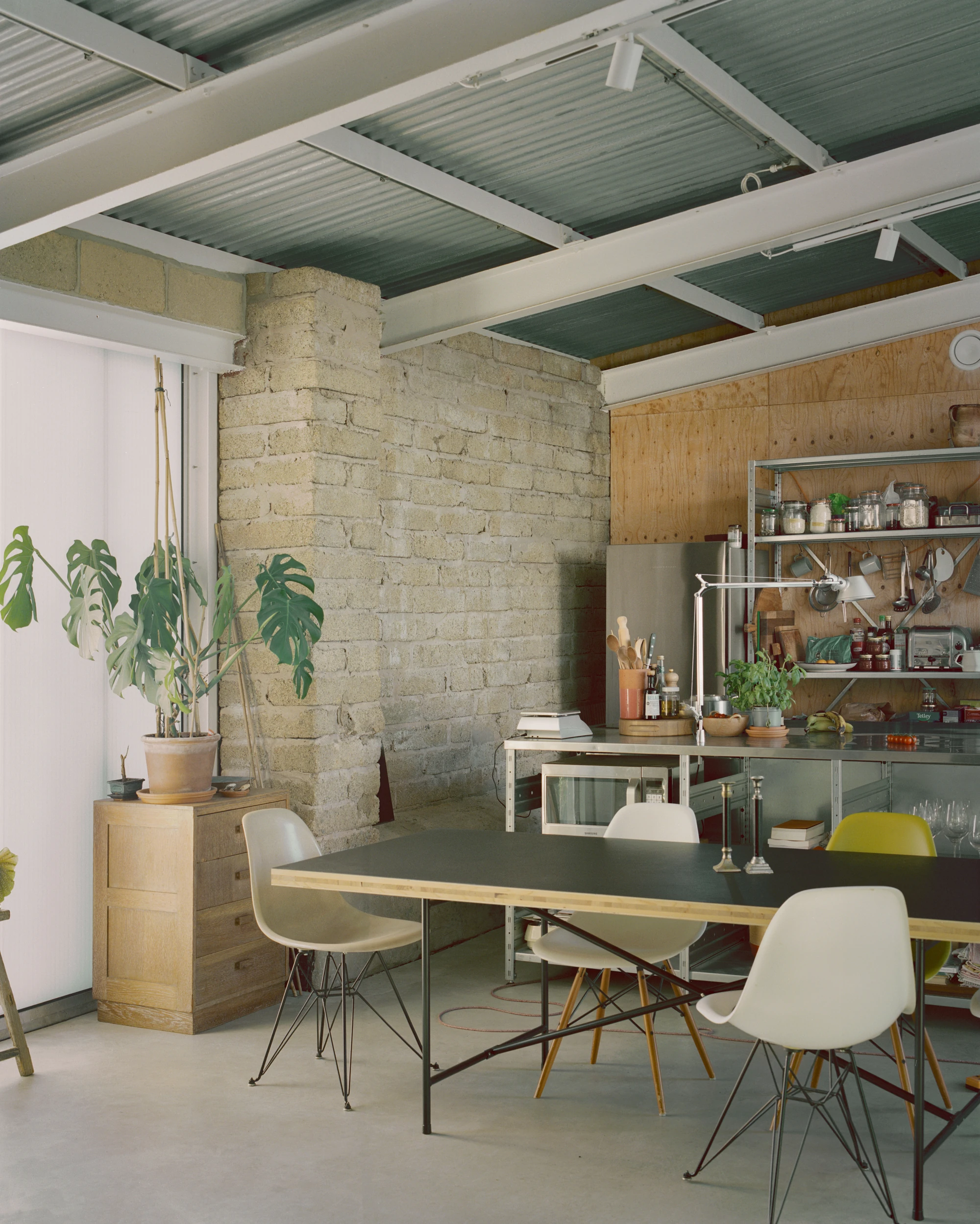 The Old Byre by Gianni Botsford Architects, photographed by Willem Pab — conversion of two farm buildings into a home and artist residency on the Isle of Wight, United Kingdom