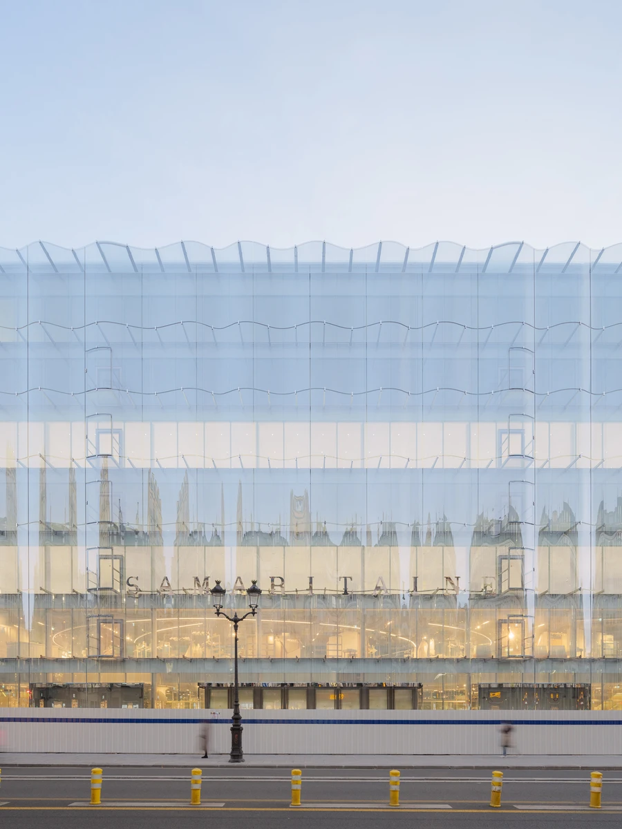 La Samaritaine by SANAA — Paris, France: Between the Rue de Rivoli and the Seine in Paris, SANAA reworks La Samaritaine, threading a public passage through the old Grand magasin behind a facade of soft, undulating glass.