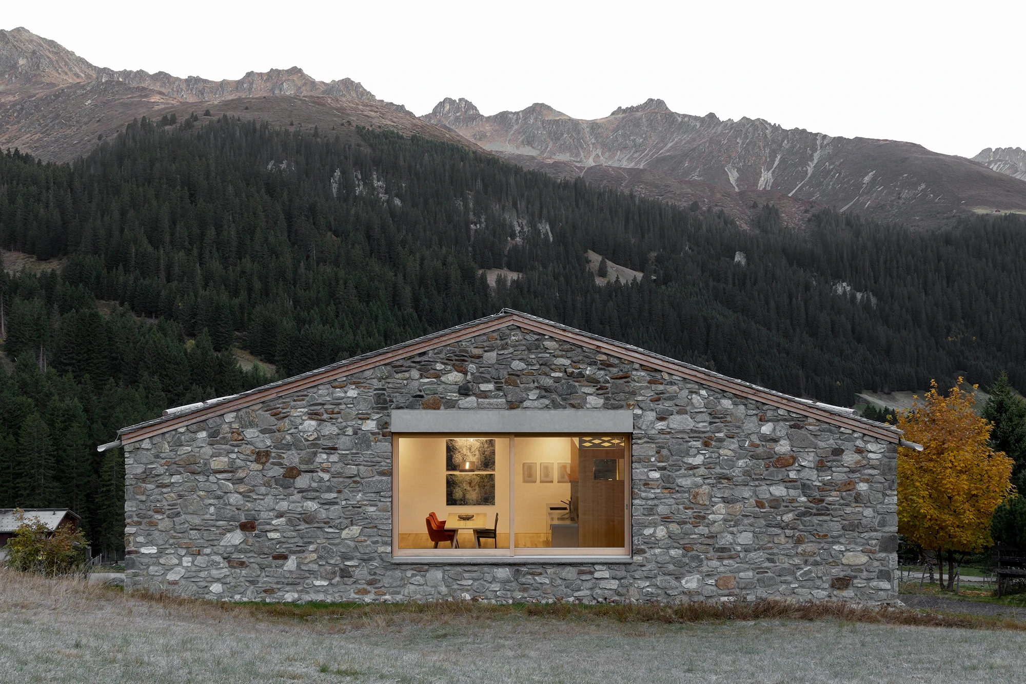 Vergalderie by Christian Tonko — Gargellen, Austria: a gable of hand-picked Montafon stone holding three holiday lofts and a sculpture gallery