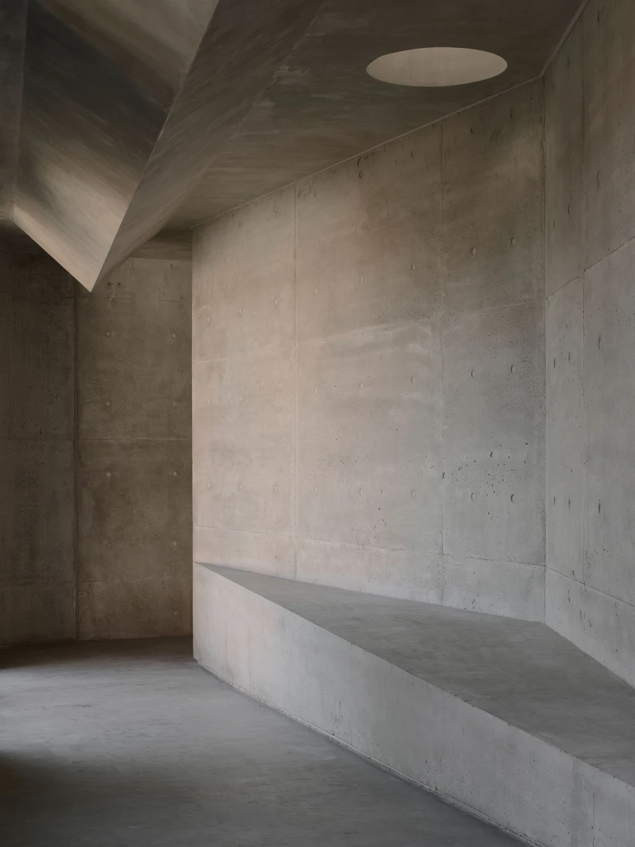 Gallery For A Tree Flyover Marcellin College by Farrell Wray Architects — Braybrook, Australia: At Marcellin College in Braybrook, west of Melbourne, Farrell Wray Architects rebuilds a walkway bridge as a concrete gallery cut open around an existing lemon