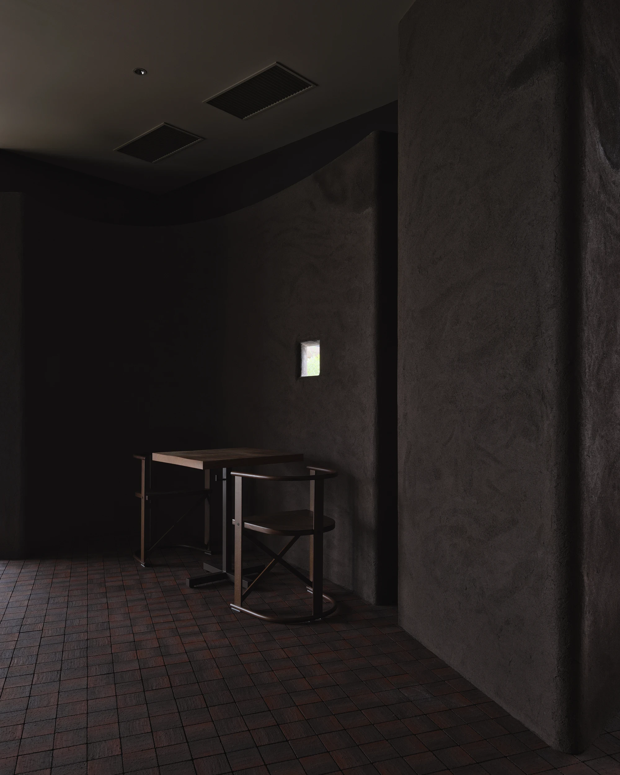 NIWA FUKUOKA by ANONIMAL design community — Fukuoka, Japan: a small table and chair sit against a hand-troweled earthen wall lit by a narrow slot window.