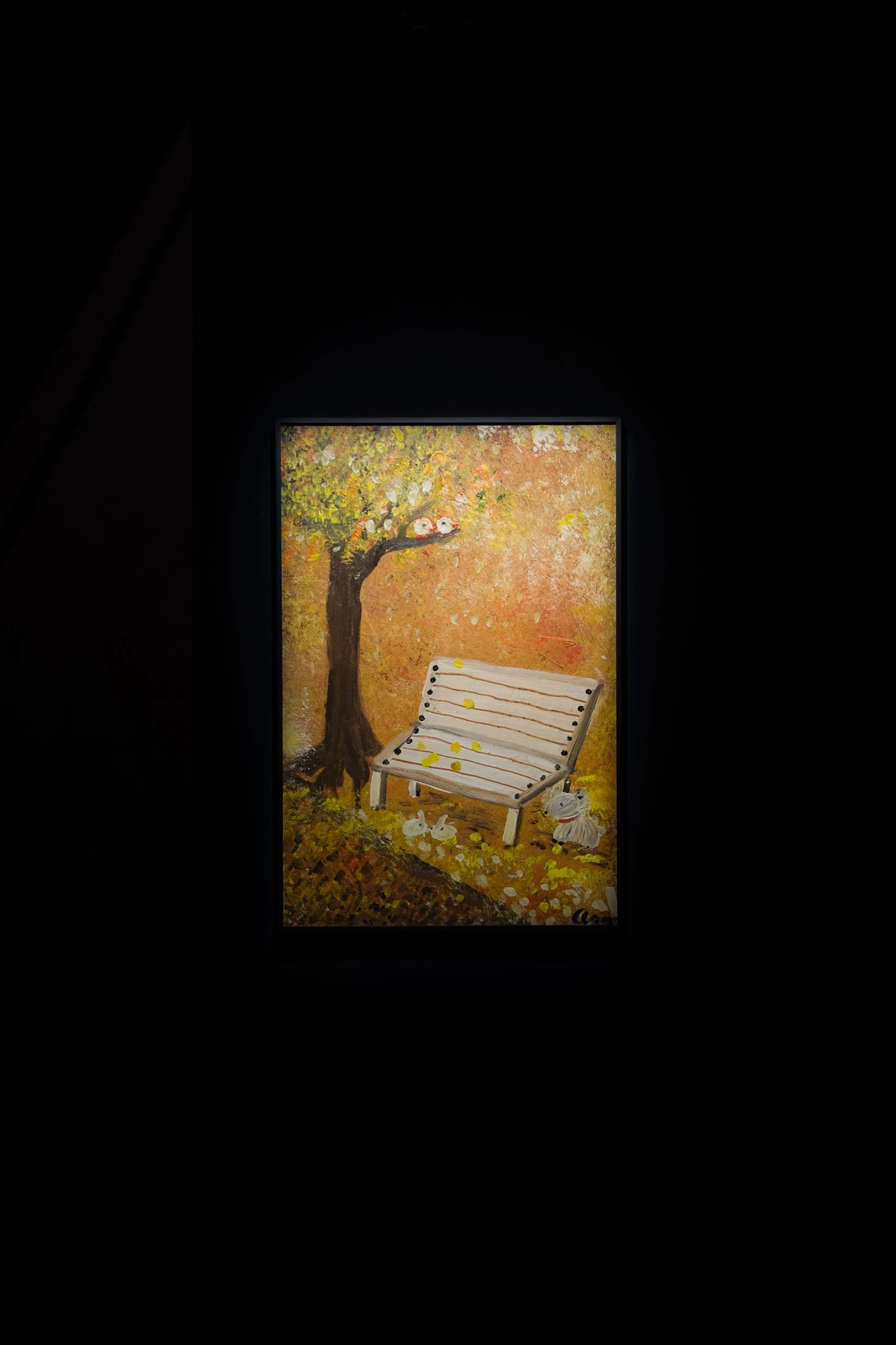 Spillover by Ann Zhao, photographed by Felix S.C. Wong — The large grey monochrome canvas of a park bench and tree leans against the wall, lit alone in a black room