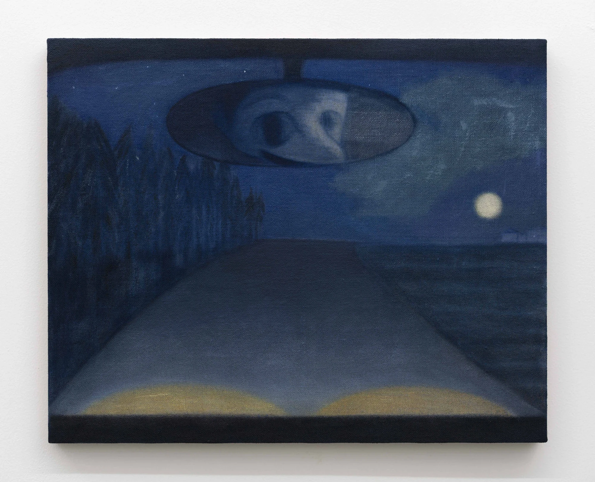 Every Day, Mostly Night, Sometimes Daylight by Satoru Kurata, photographed by Michela Pedranti -- A small blue nocturne of a moonlit road running into hills, an open book faintly luminous in the foreground and a mirrored ellipse suspended in the sky