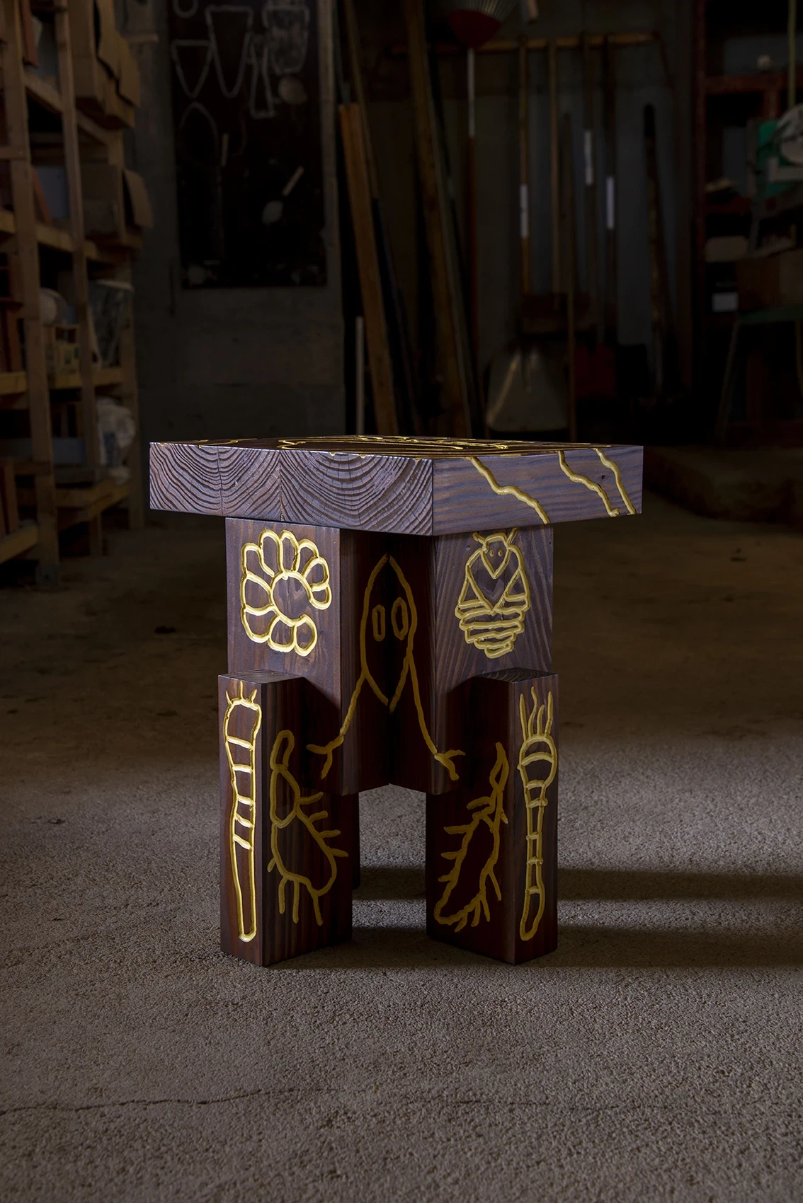 Les Rhizopodes by Barreau Charbonnet — A four-legged stool seen front-on, a standing figure, an insect and radiating cells outlined in glowing yellow