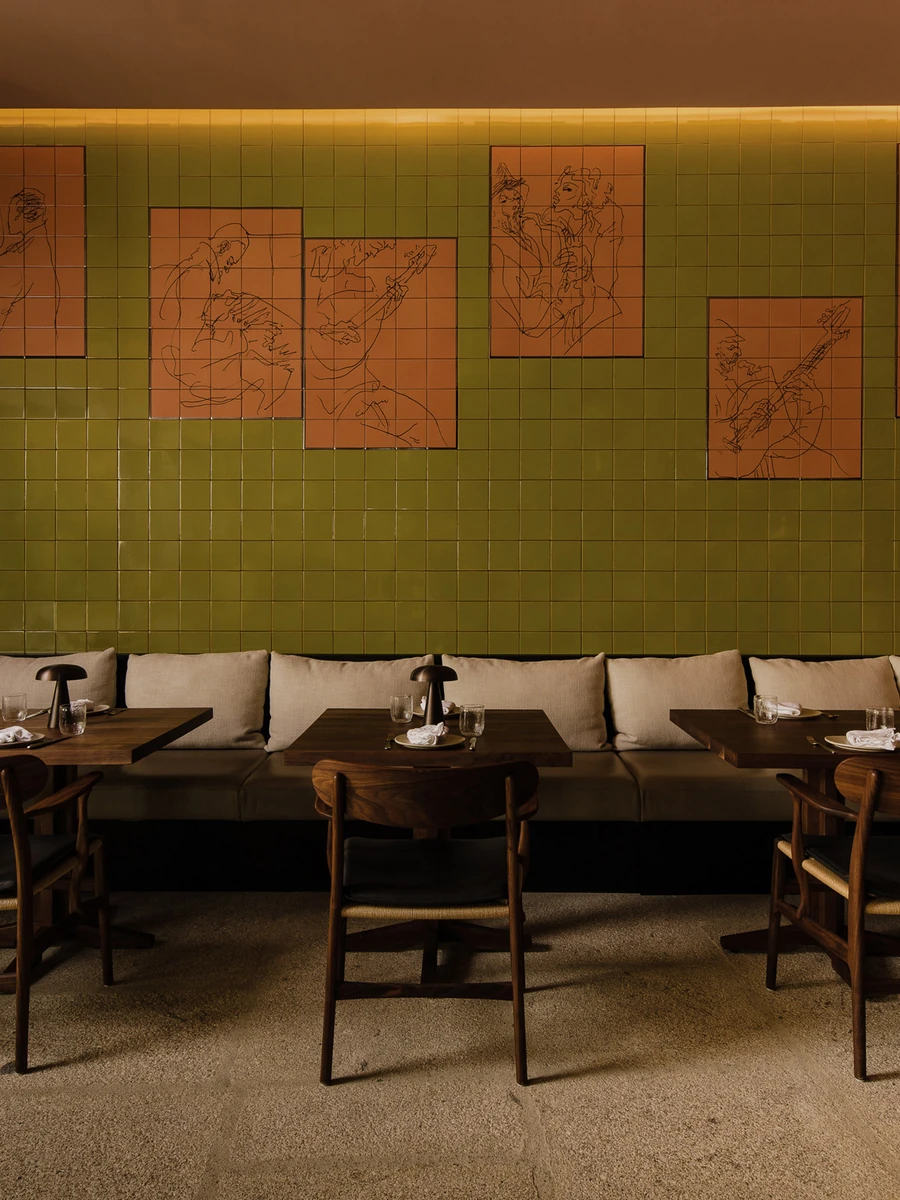 Cozinha das Flores Mural by Álvaro Siza — Porto, Portugal: musicians in black line, hand painted dot by dot onto green and burnt orange tiles