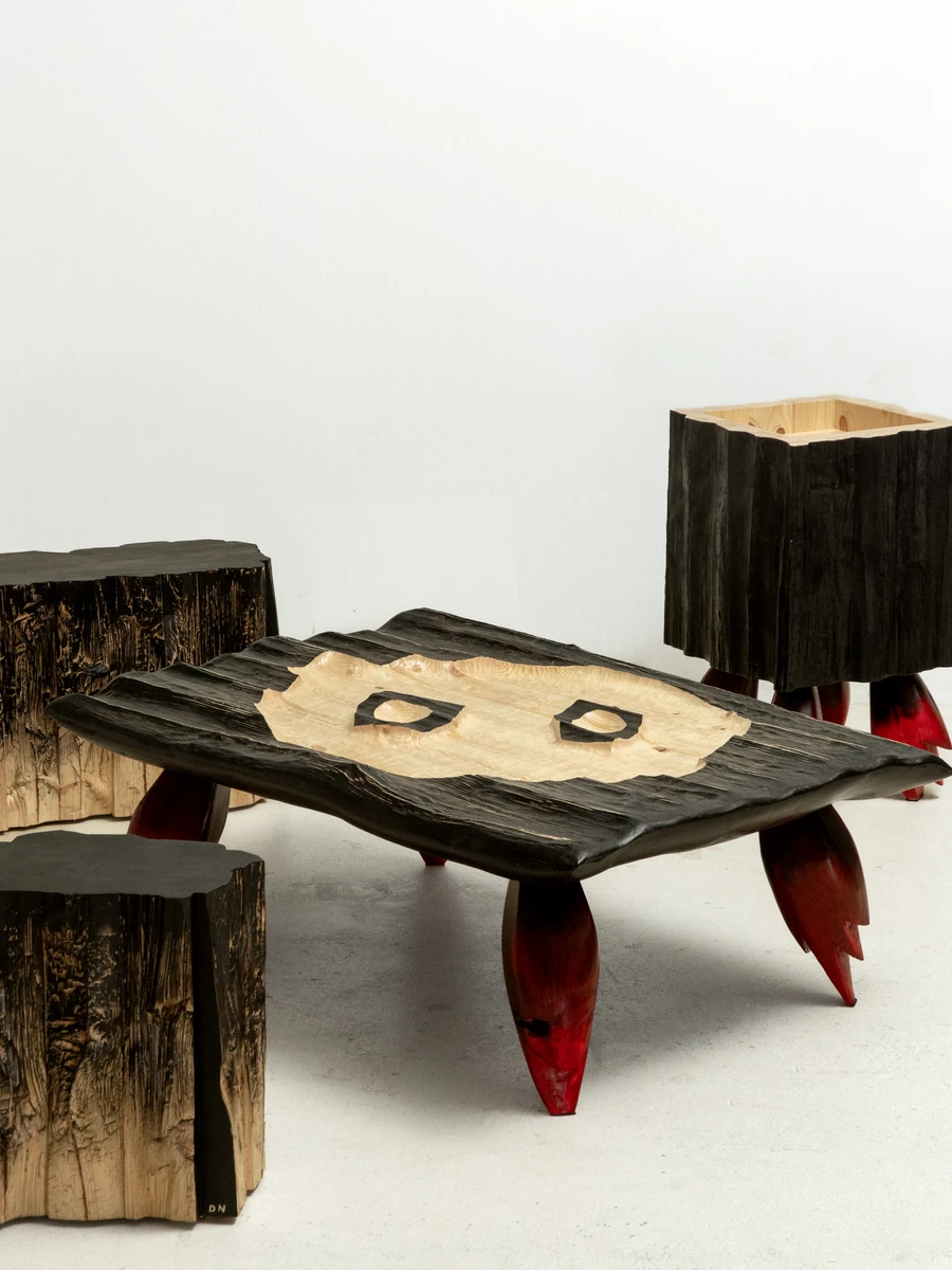 In Between Wood and Fire by Didi NG Wing Yin, photographed by Didi NG Wing Yin — The collection on a white ground, the Rocket Side Coffee Table in front of Rocket Side Table No.2 with the two Pith stools entering at the left edge.